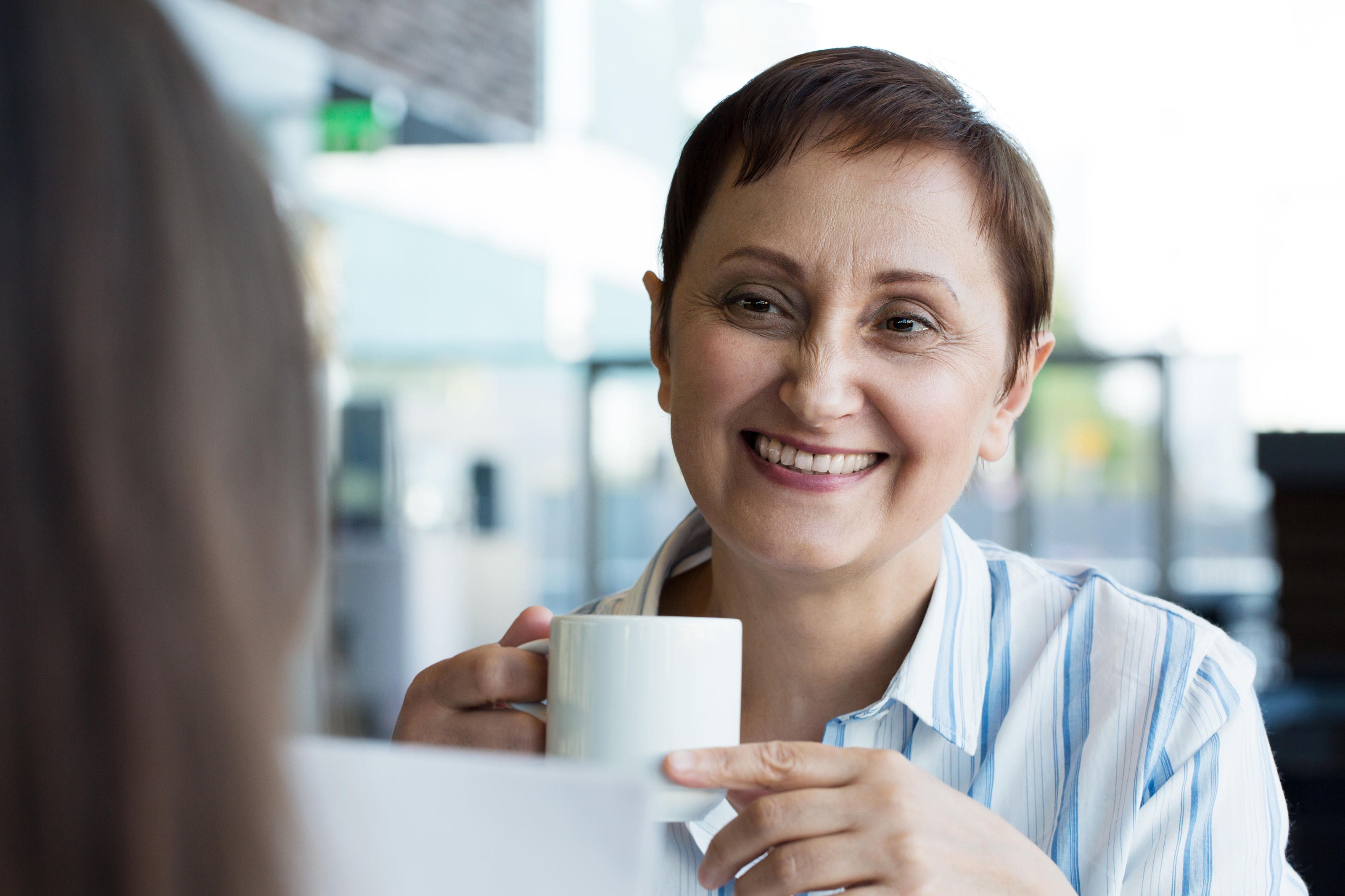 Nearly half of women feel they need to ‘hide’ menopause symptoms at work (Alamy/PA)