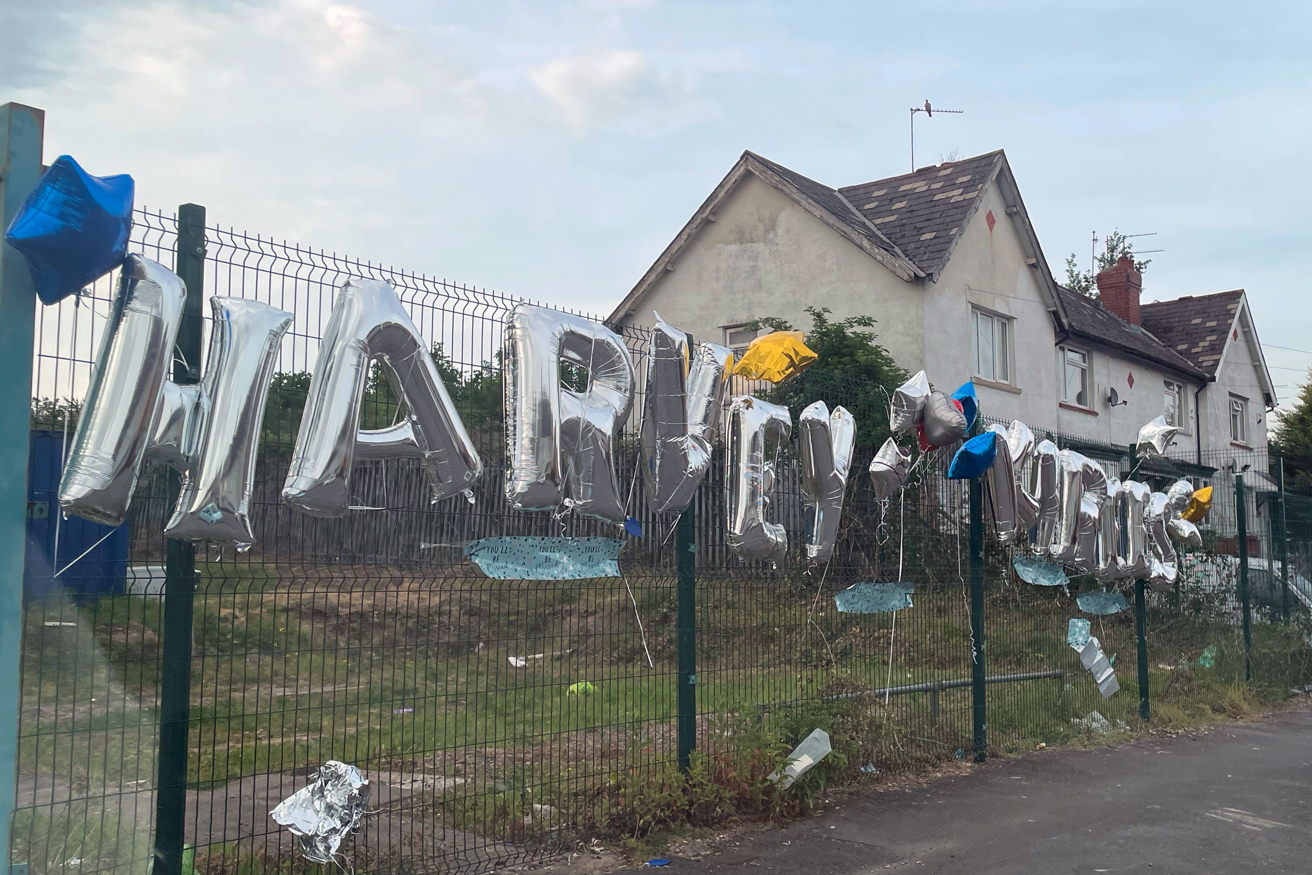 Tributes left for the teenagers whose deaths in a car crash sparked a riot