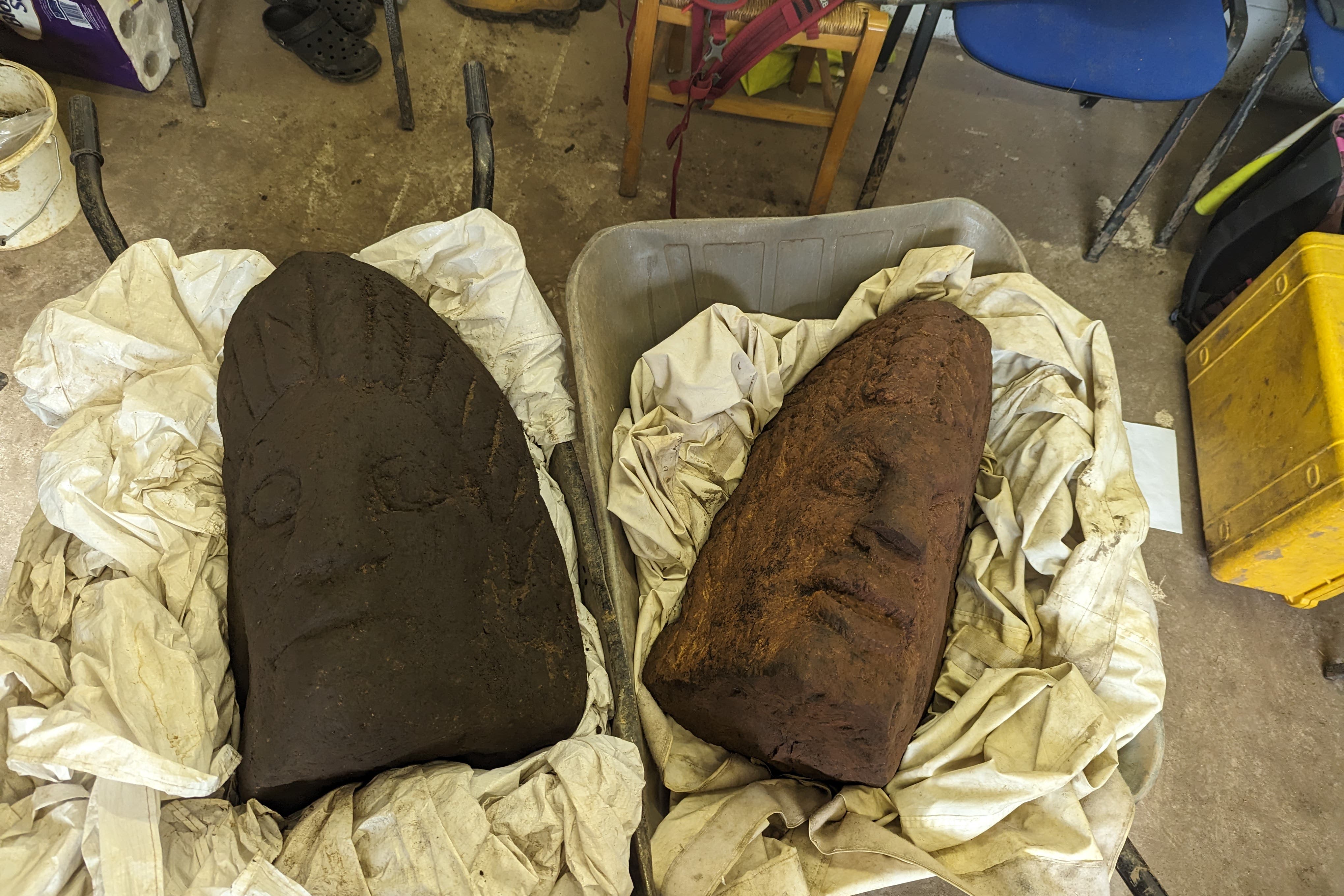 Two sandstone heads unearthed during an archaeological dig in Carlisle, Cumbria (Anna Giecco/PA)