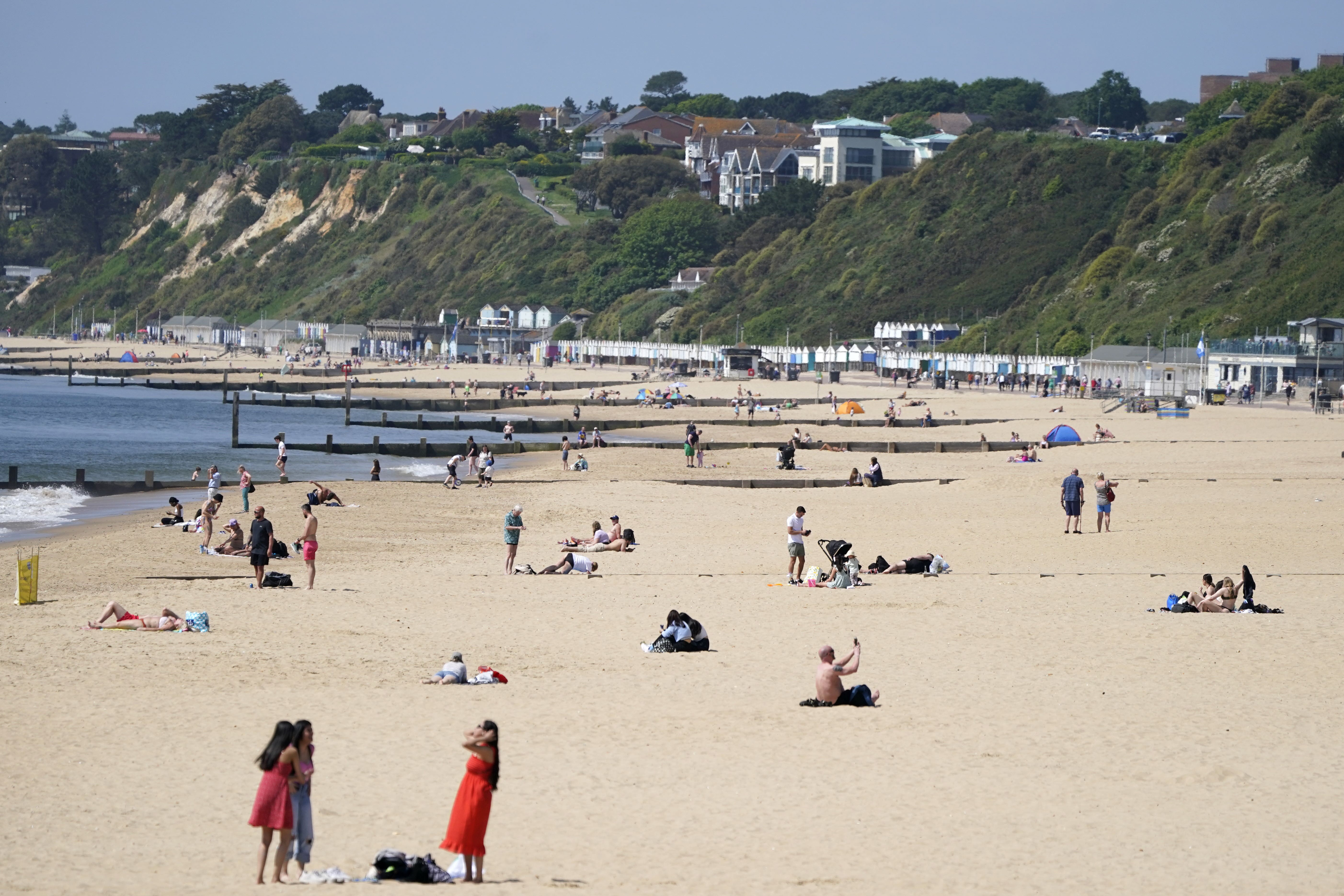 People enjoy the warm weather on Bournemouth beach in Dorset. Picture date: Wednesday May 24, 2023.