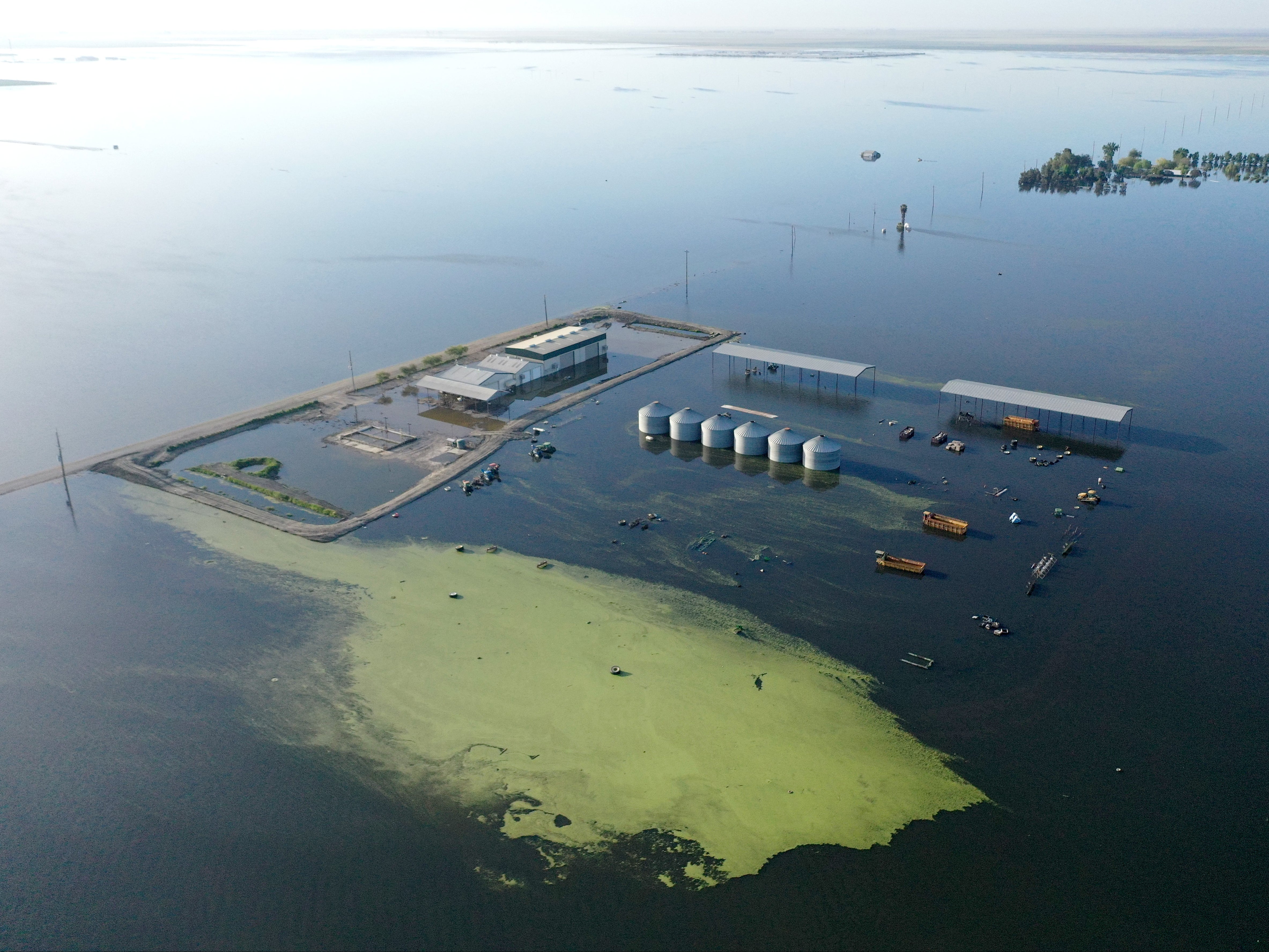 An aerial view of floodwaters inundating farmland in the reemerging Tulare Lake, in California