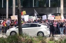 Anti-DeSantis protesters demonstrate outside Miami hotel amid meeting of governor’s donors