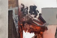 Dramatic moment wall crumbles as massive fire engulfs seven-storey building in Sydney