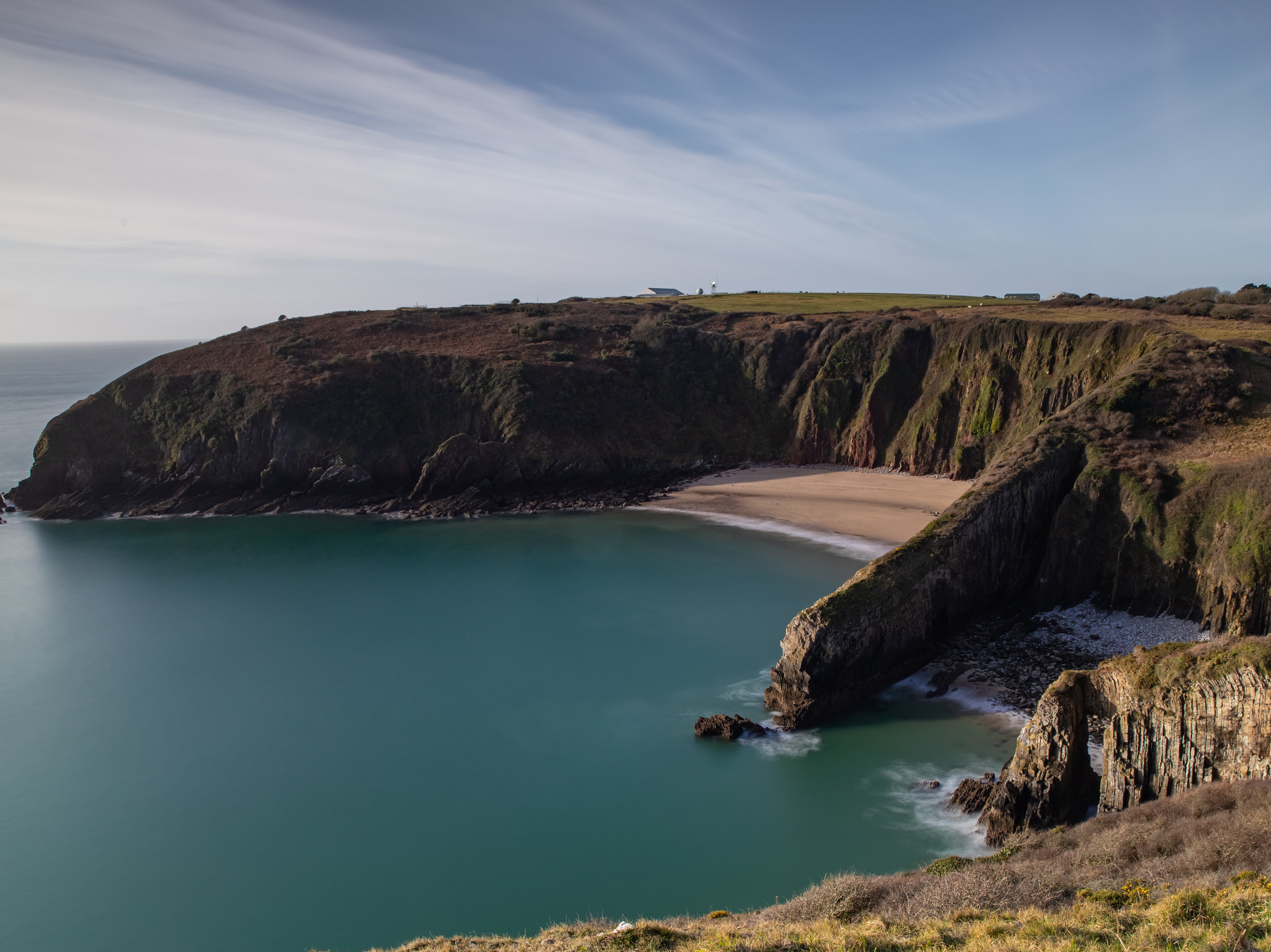 This secret Welsh beach is framed by dramatic cliffs