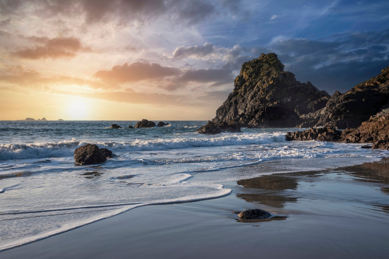 A sunset over part of Kynance Cove