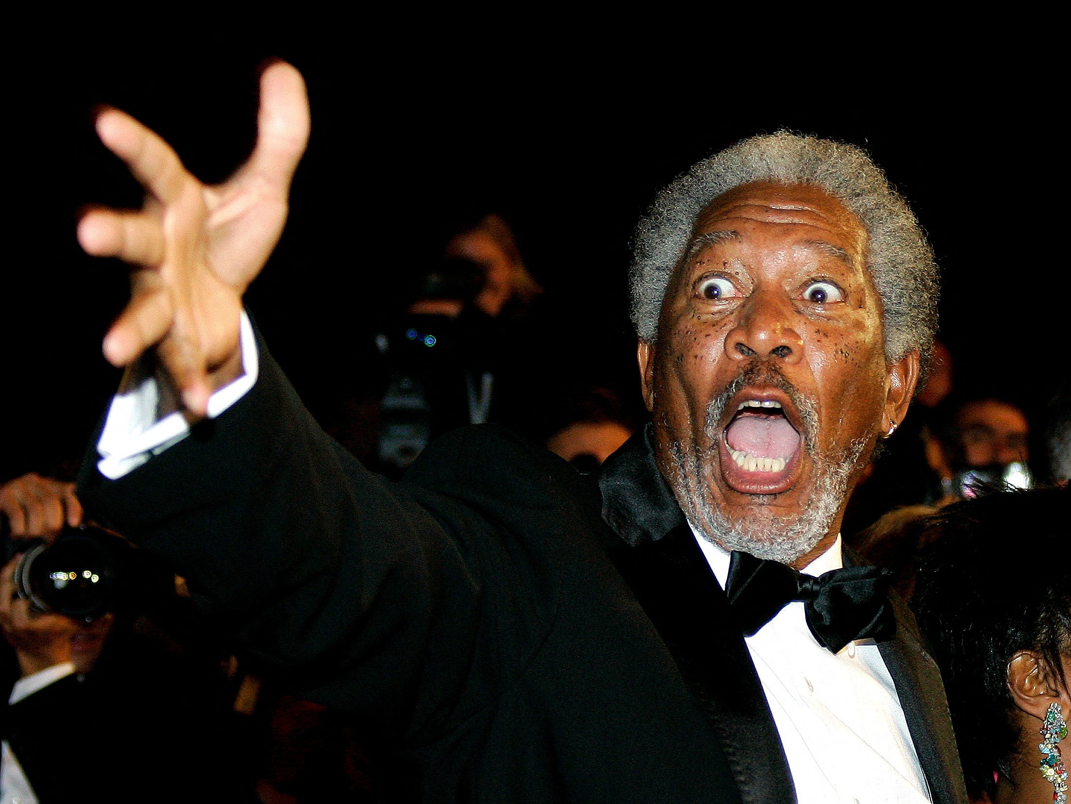 Morgan Freeman poses as he arrives on the red carpet for Robert Rodriguez and Frank Miller’s film ‘Sin City’ at the 58th Cannes on 18 May 2005