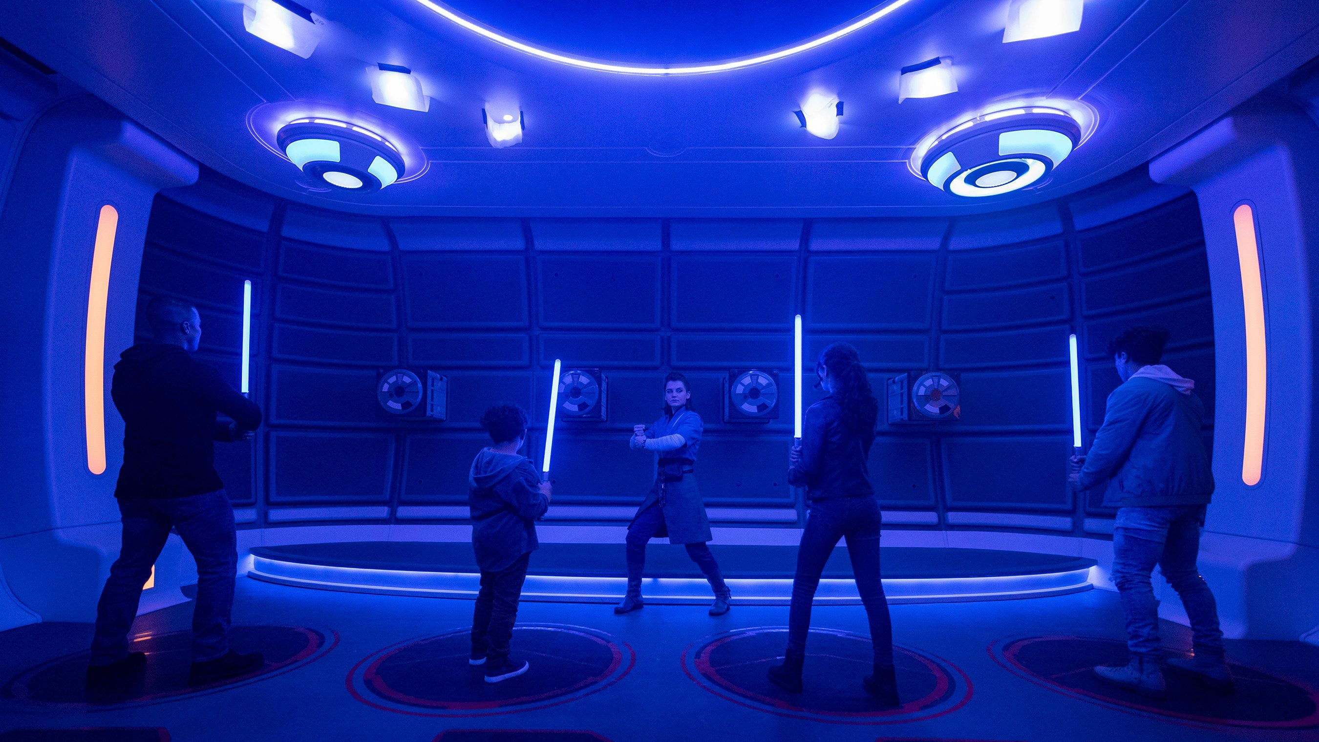 Passengers learn the ancient art of wielding a lightsaber in the Lightsaber Training Pod onboard the Halcyon starcruiser