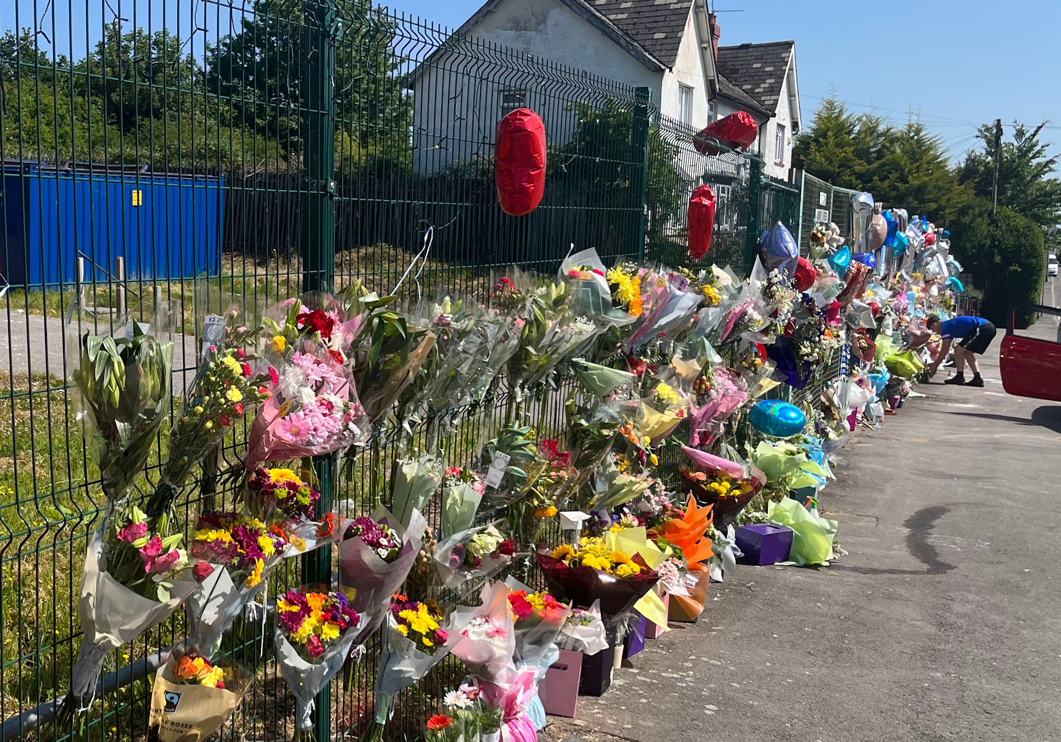 Floral tributes left to Kyrees Sullivan and Harvey Evans on Snowden Road, Ely, Cardiff