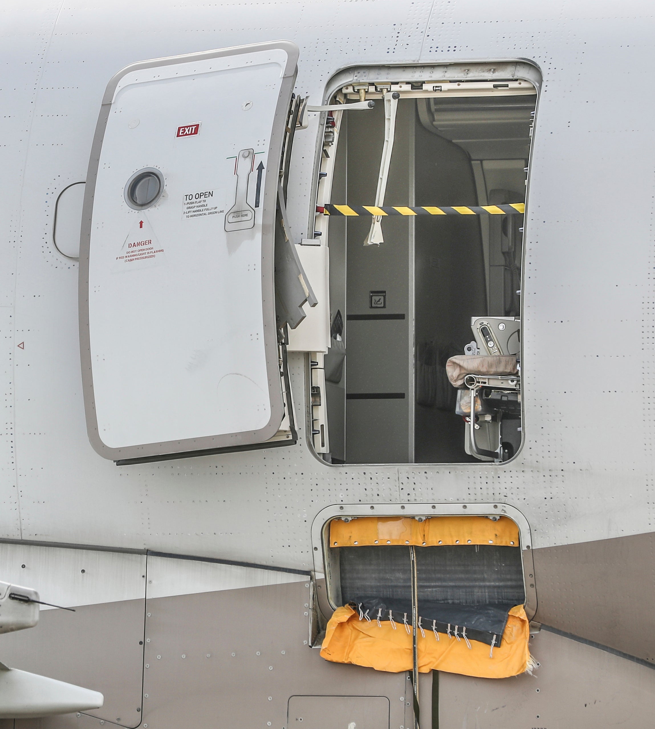 An emergency exit door of an Asiana Airlines plane is seen at Daegu International Airport