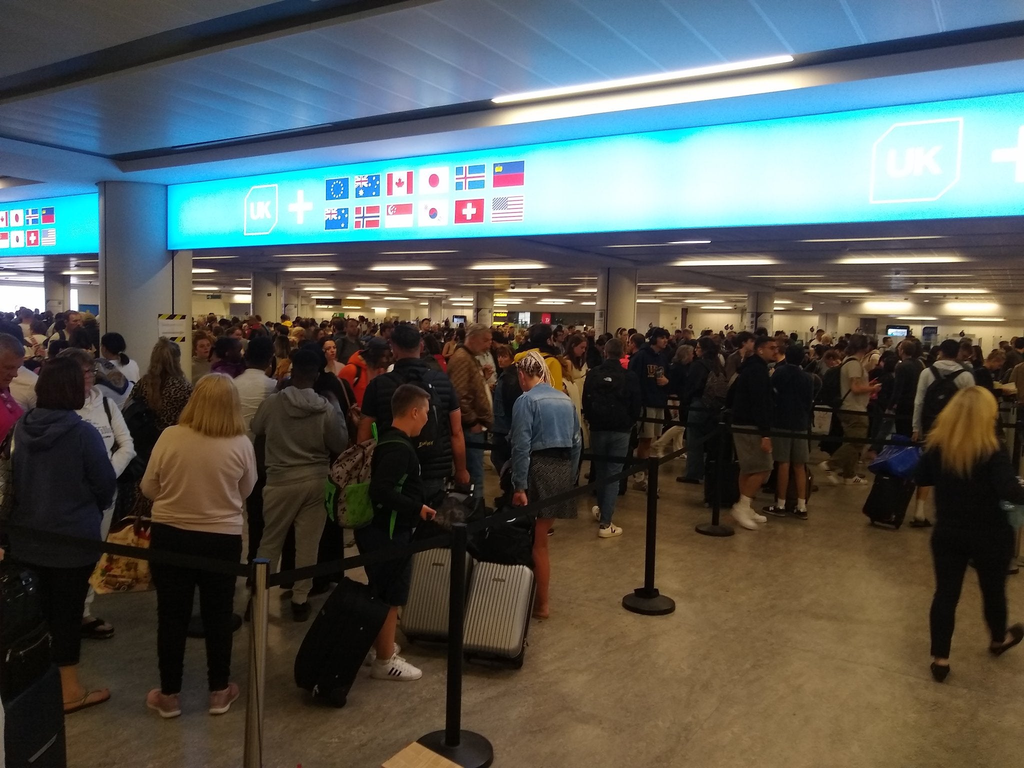 Passengers are facing travel chaos as electronic passport gates have gone down across UK airports