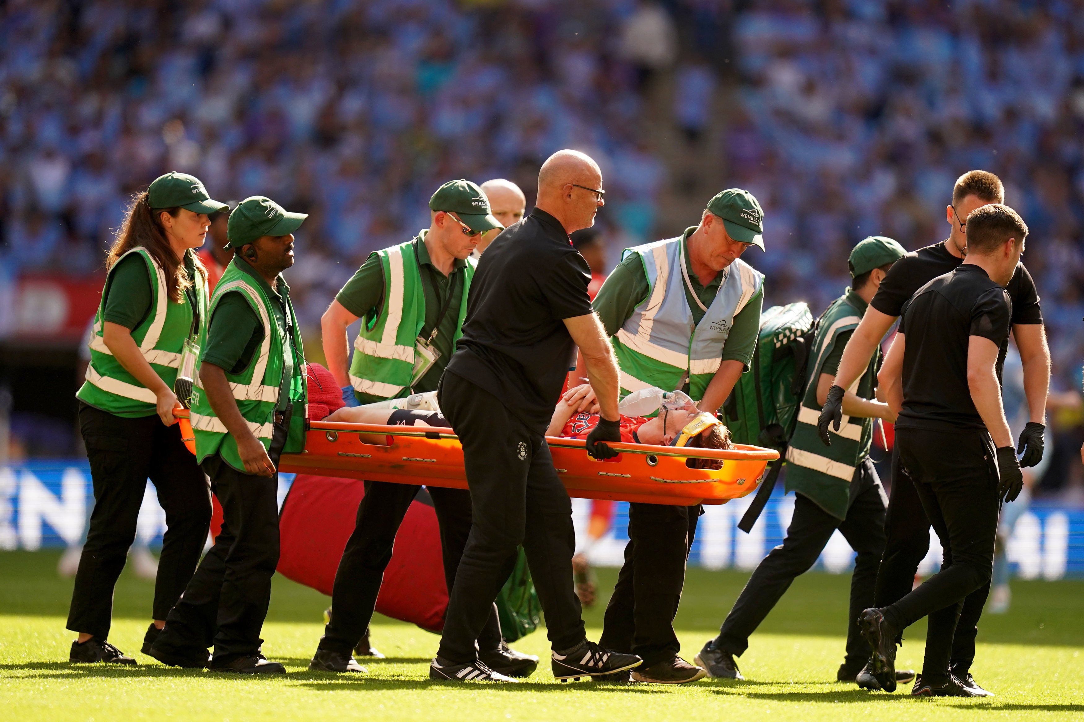 Luton captain Tom Lockyer was stretched off but the club later confirmed he was responsive and undergoing further tests in hospital