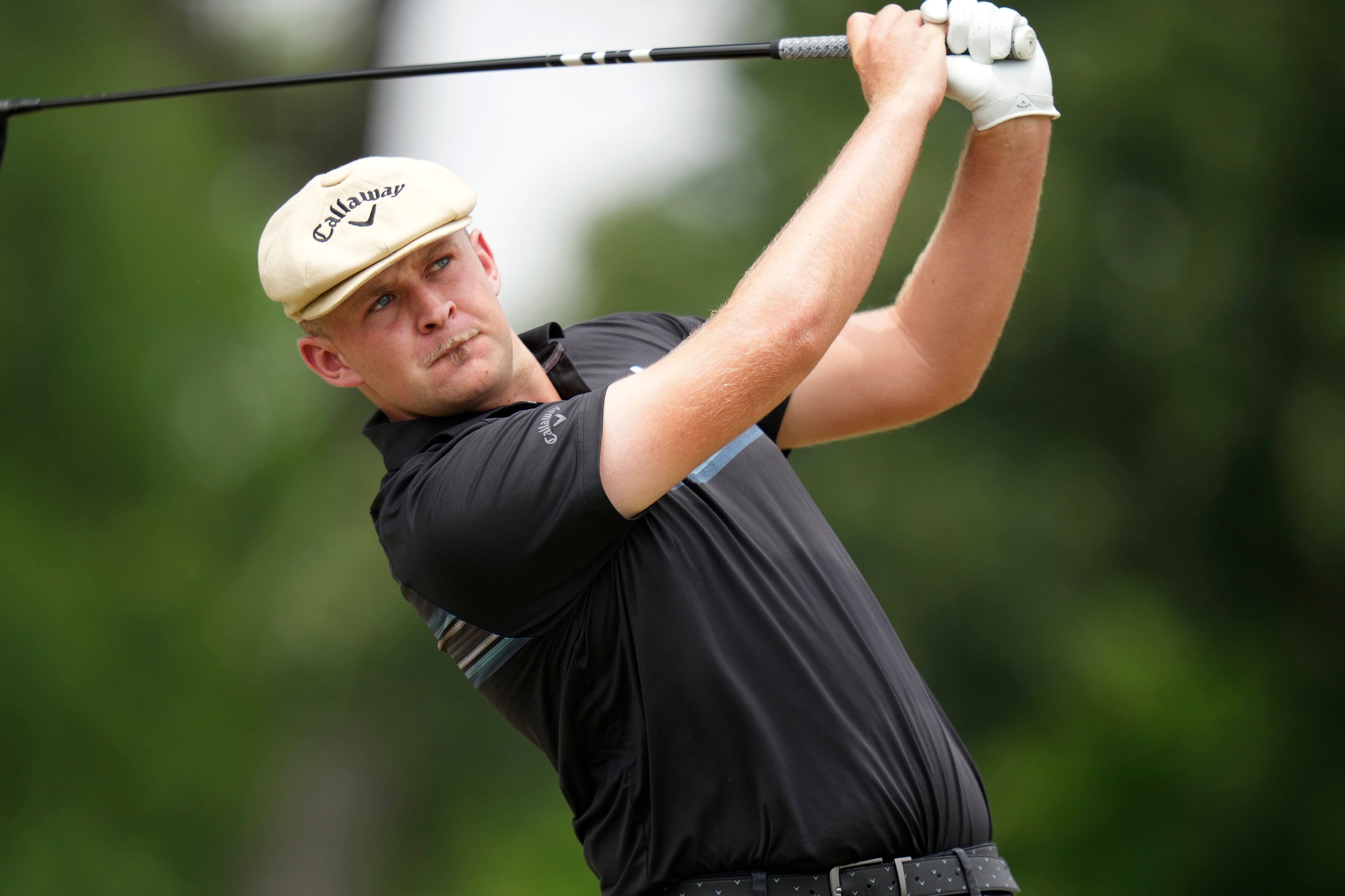 Harry Hall hits a tee shot on the third hole (LM Otero/AP)