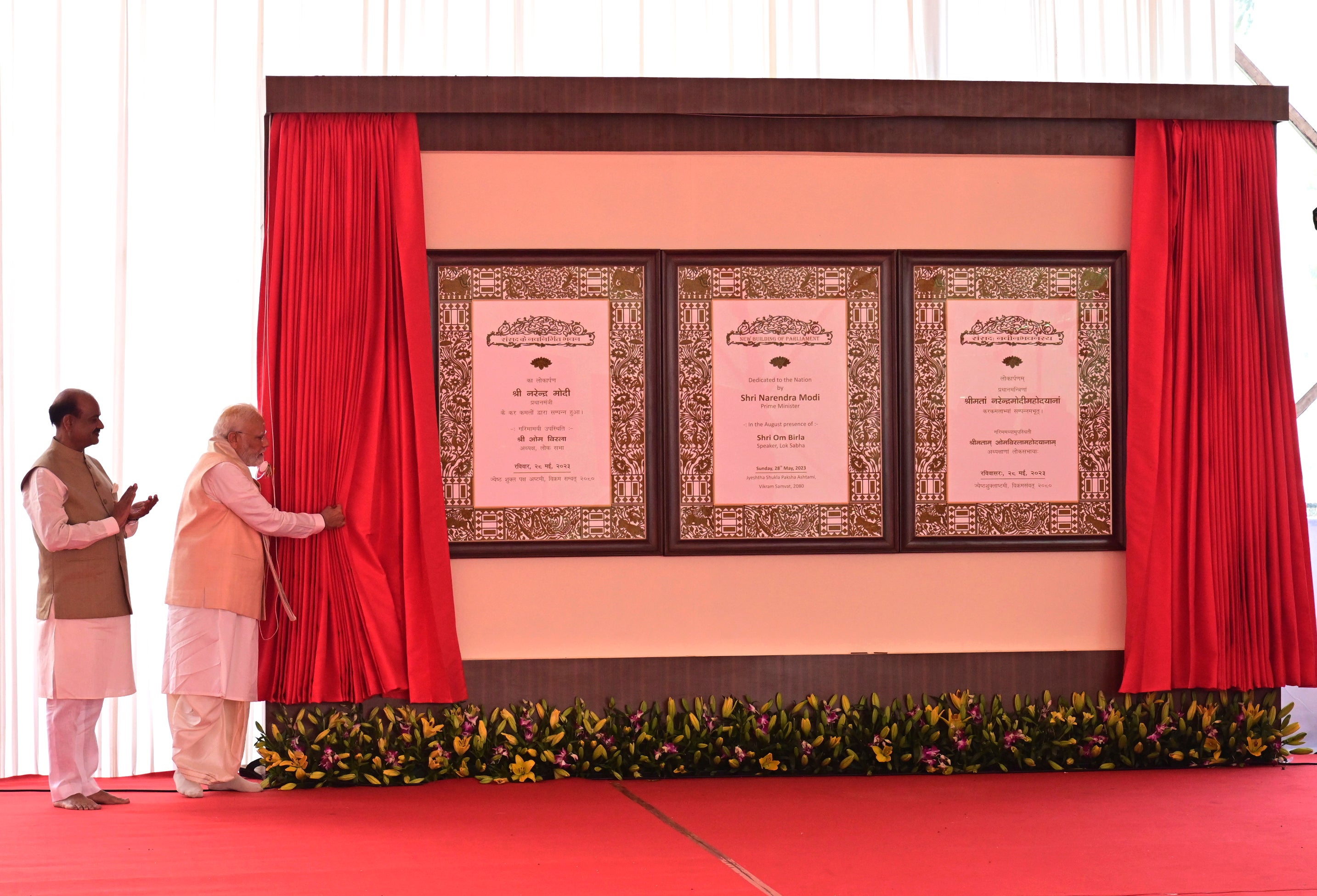 Modi inaugurates the new parliament building watched by the speaker of the lower house, Om Birla