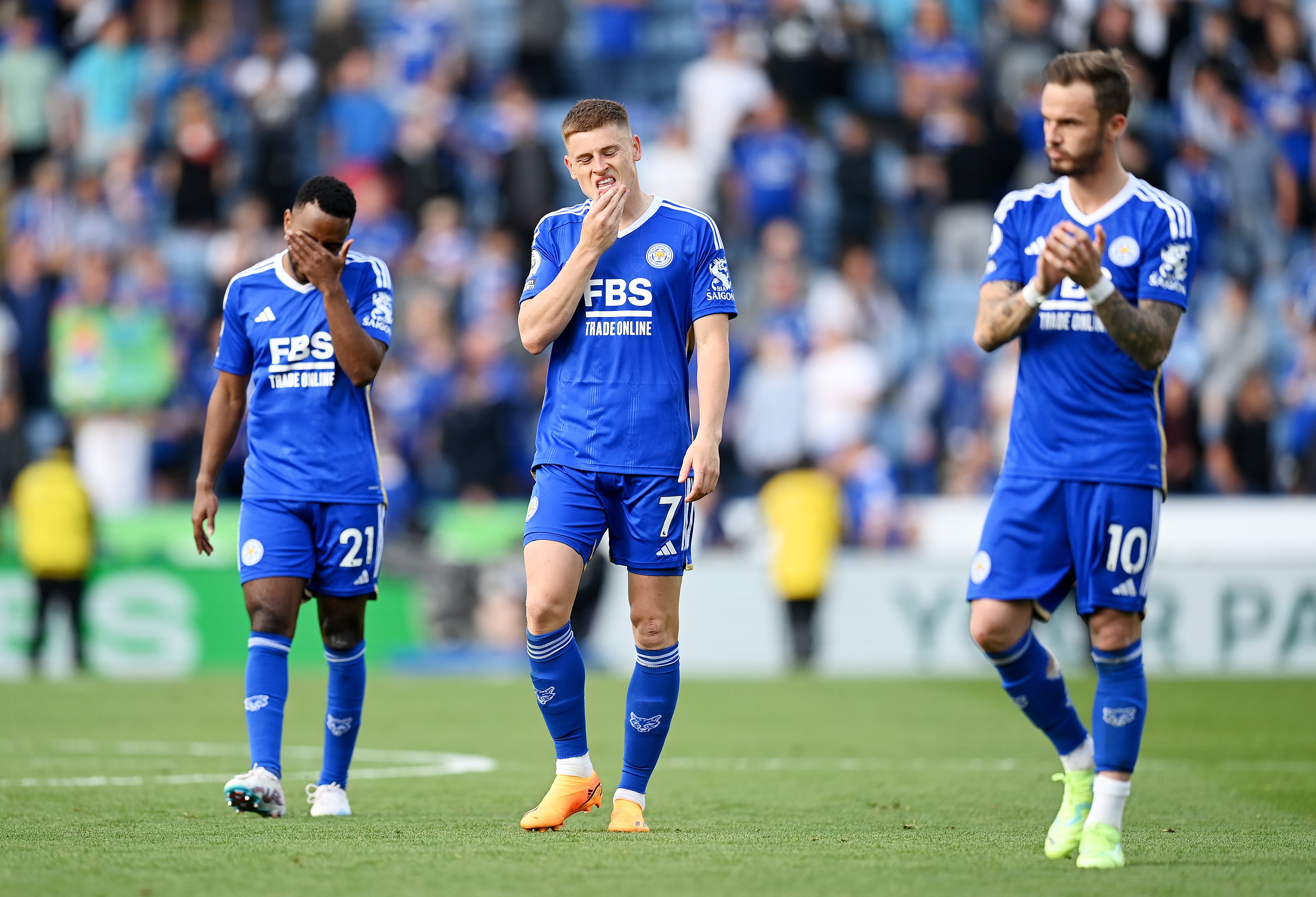 Leicester players look dejected after their relegation from the Premier League