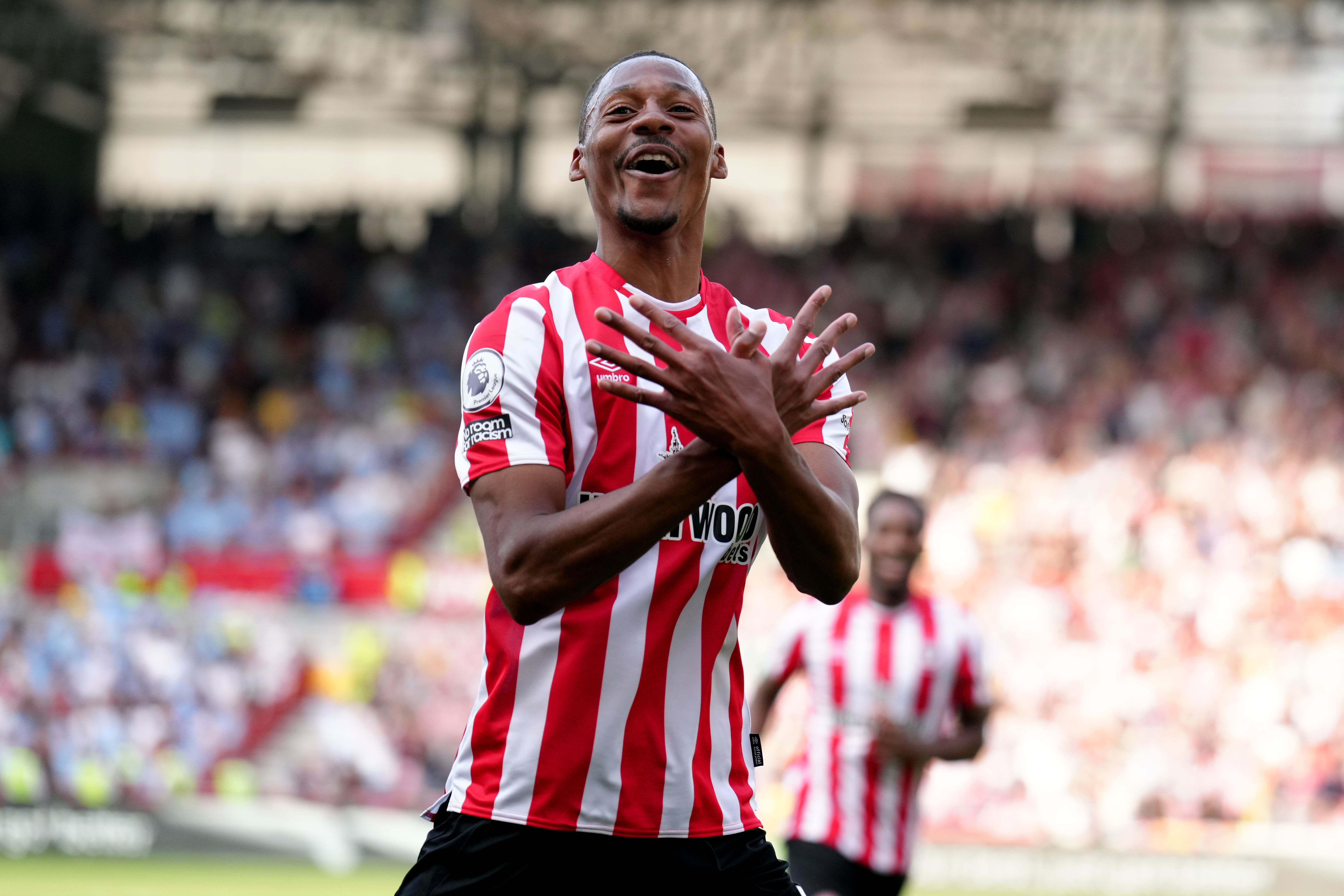 Brentford’s Ethan Pinnock celebrates his winning goal (PA)