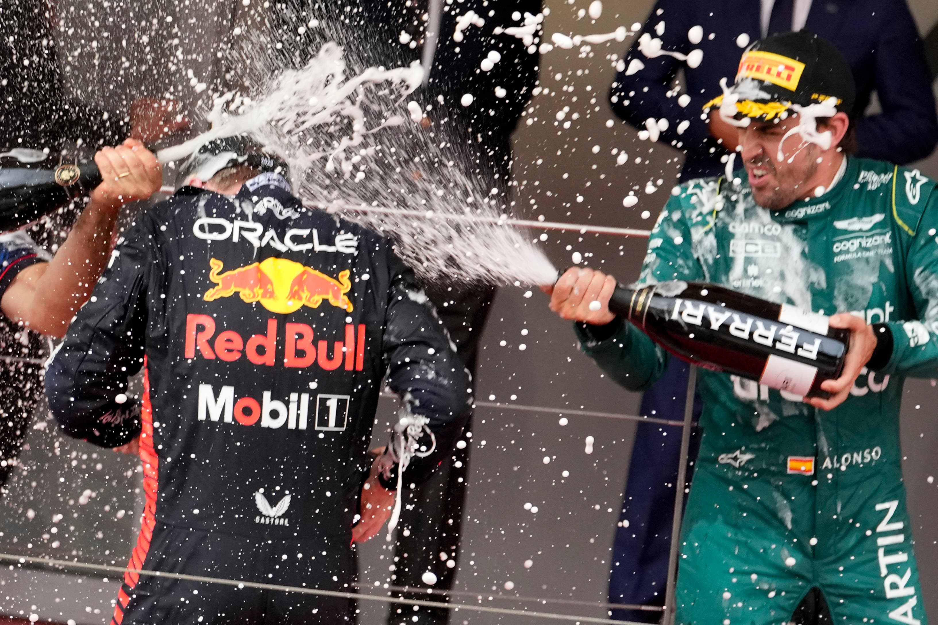 Fernando Alonso (right) was on the podium again at Monaco (Luca Bruno/AP)