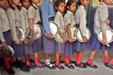 100 children rushed to hospital after dead snake found in school lunches in India