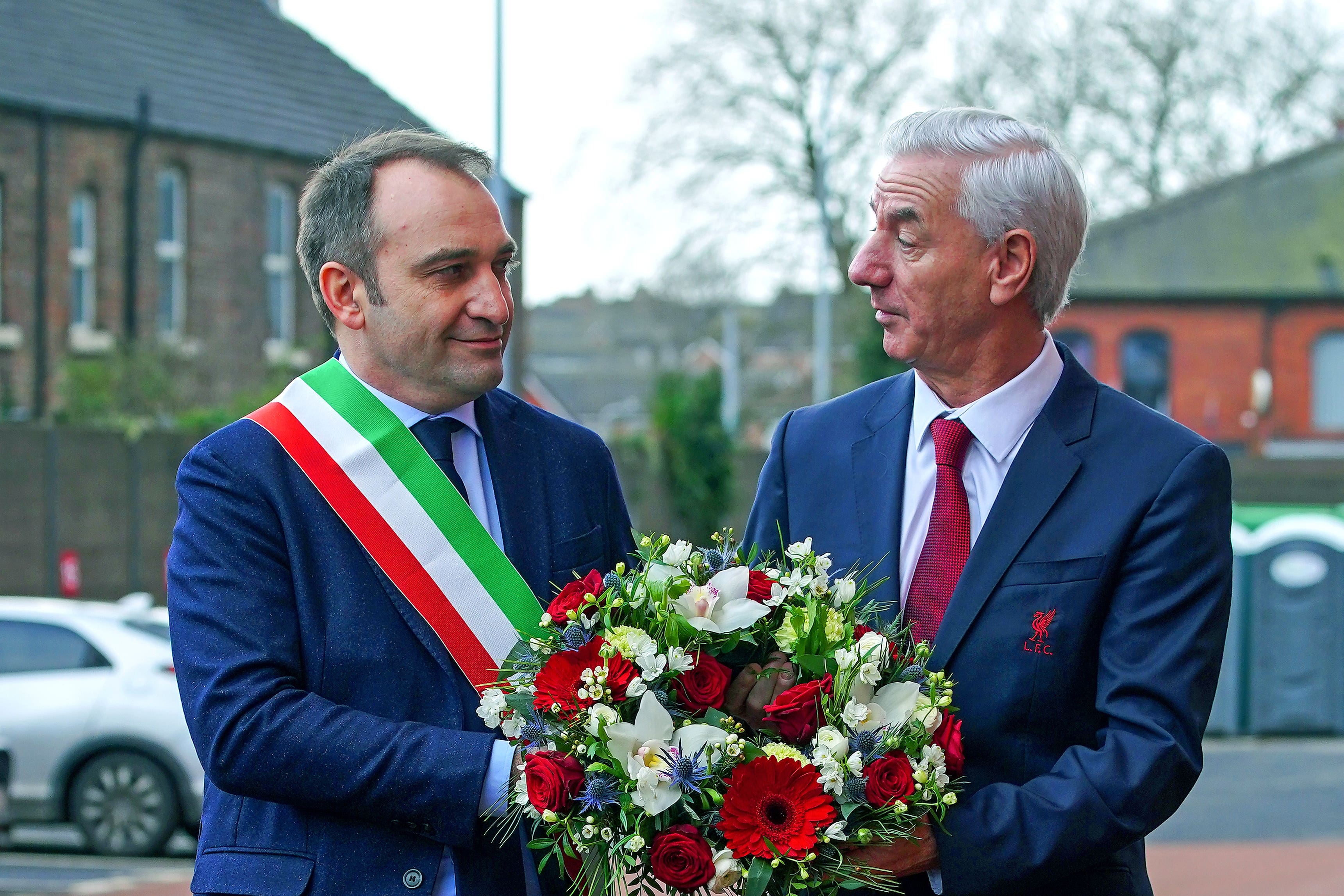 Mayor of Turin Stefano Lo Russo (left) and former Liverpool striker Ian Rush pay their respects (Peter Byrne/PA)