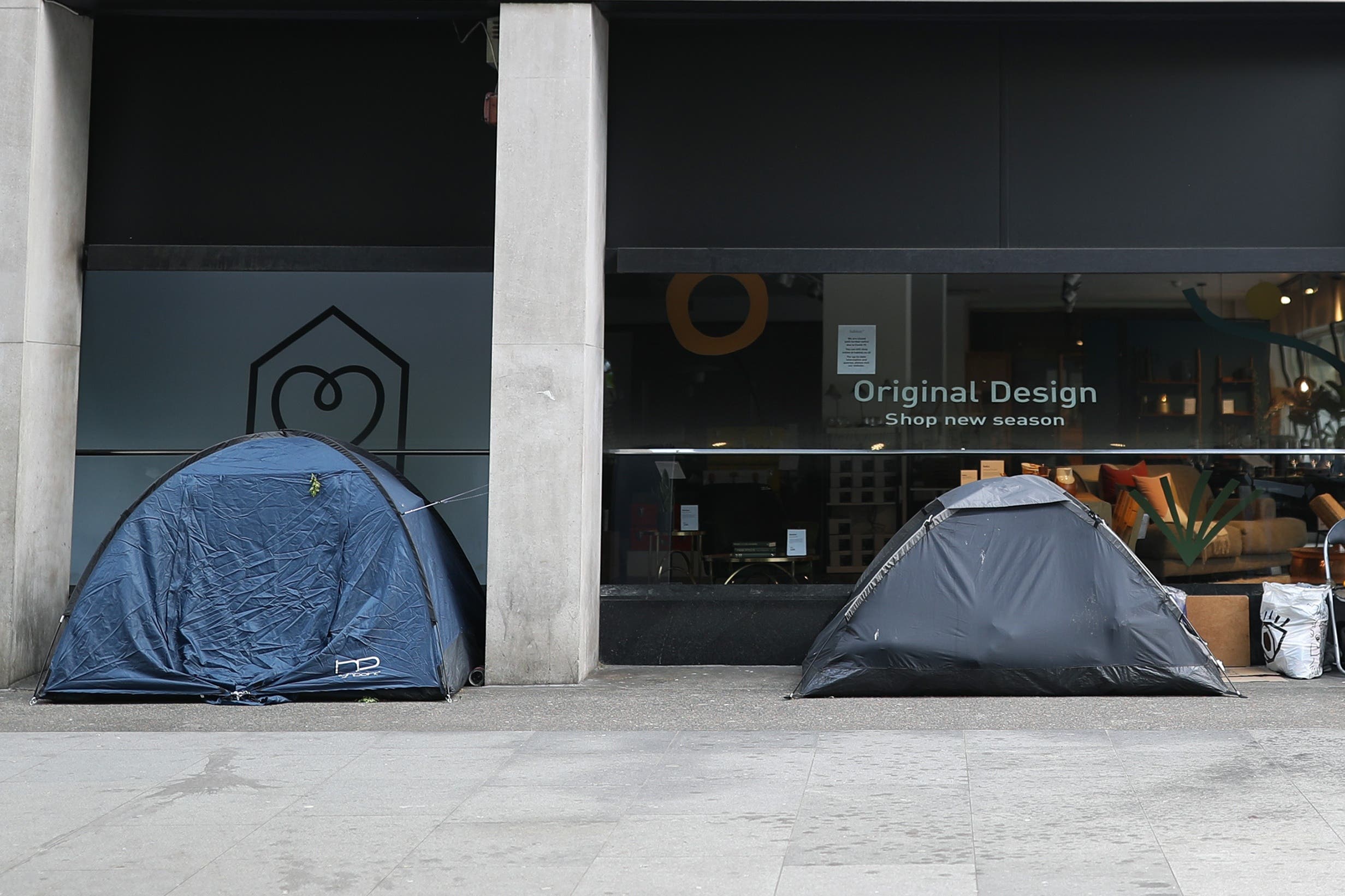 Homeless tents outside a shop (Yui Mok/PA)