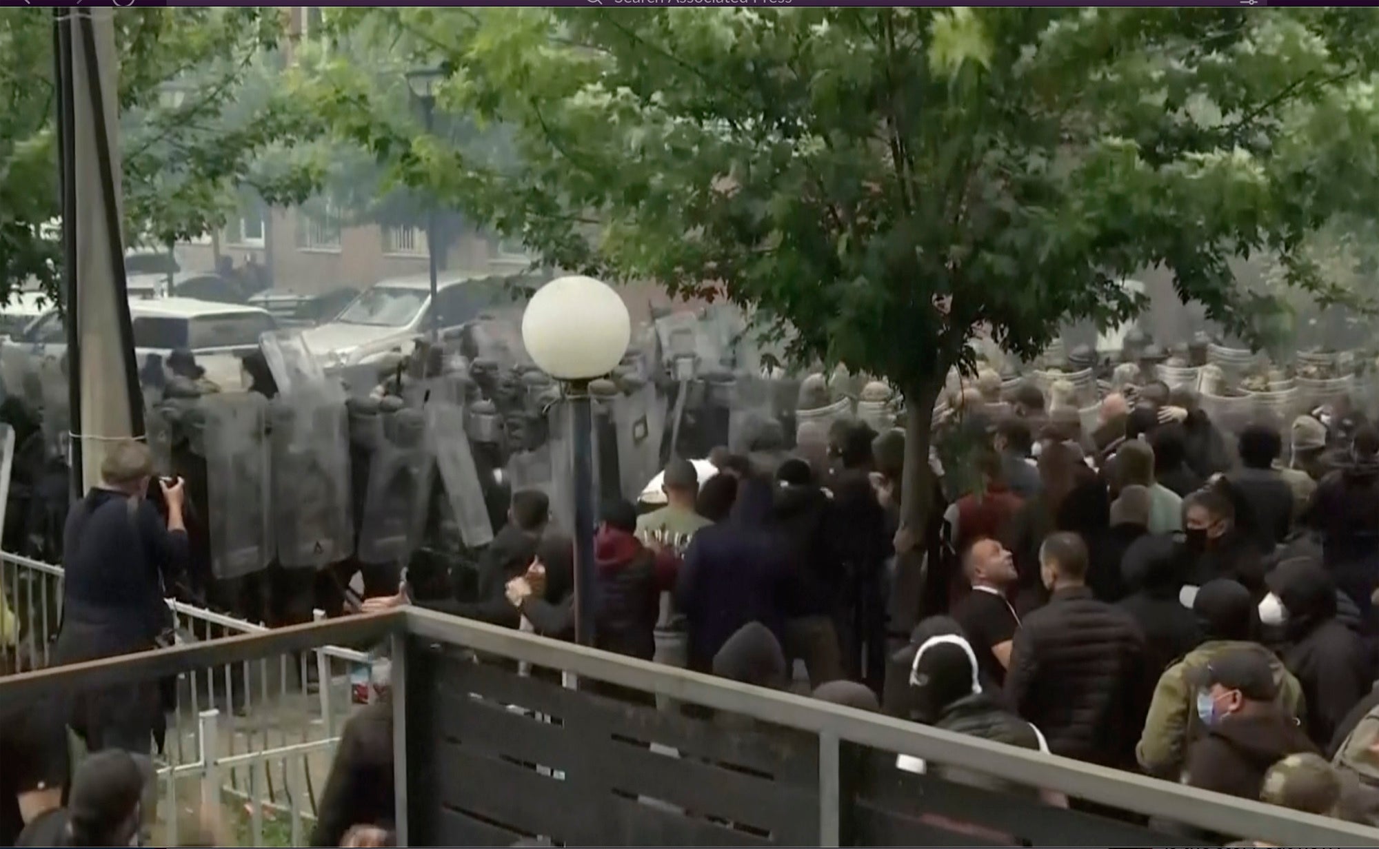 Nato peacekeepers guard a municipal building after clashes with Kosovo Serbs