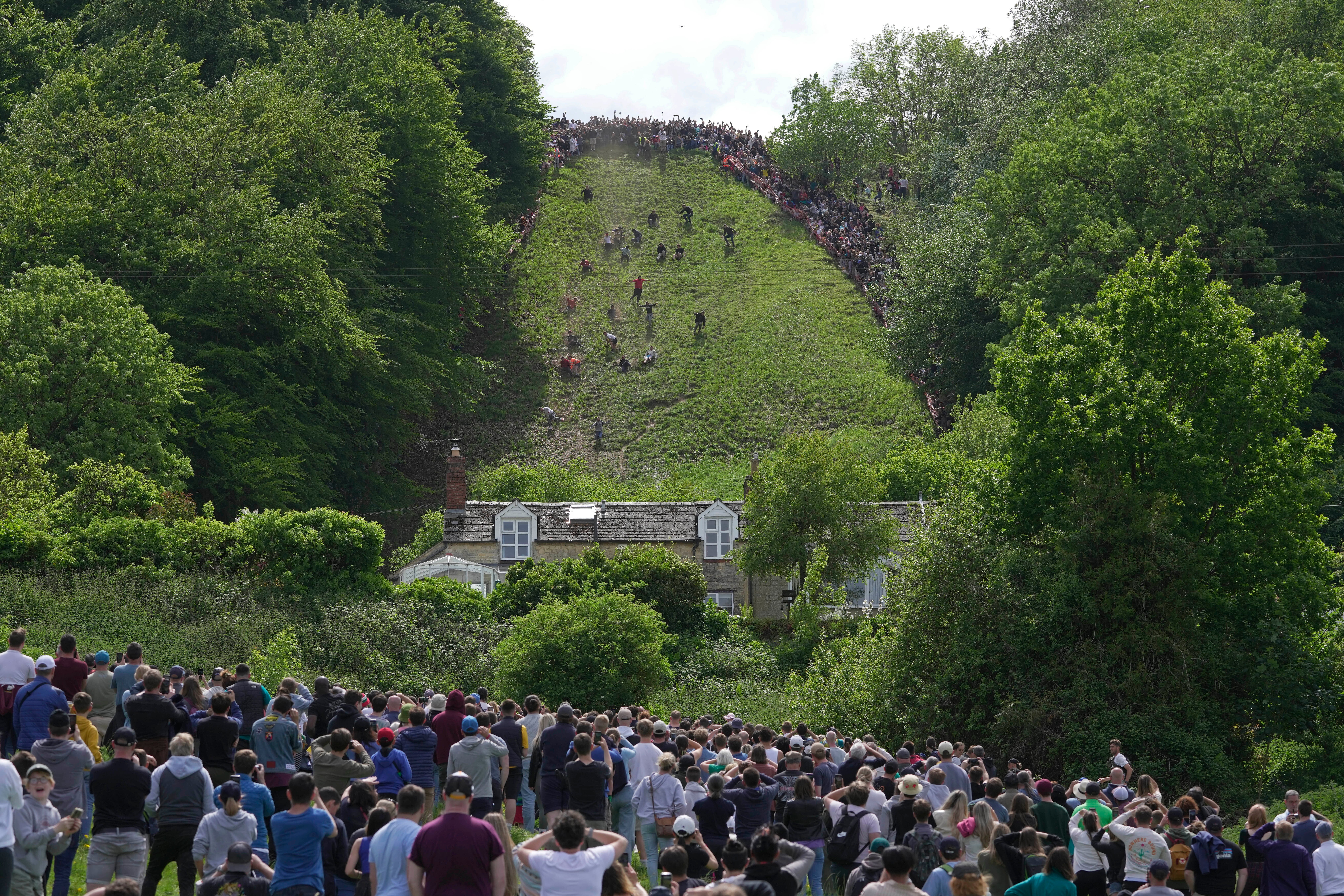 APTOPIX Britain Cheese Rolling
