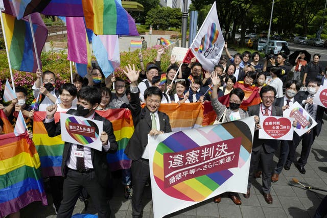 <p>Celebrations outside Nagoya District Court in Japan on Tuesday after the ruling that the bar on same-sex marriage is unconstitutional</p>