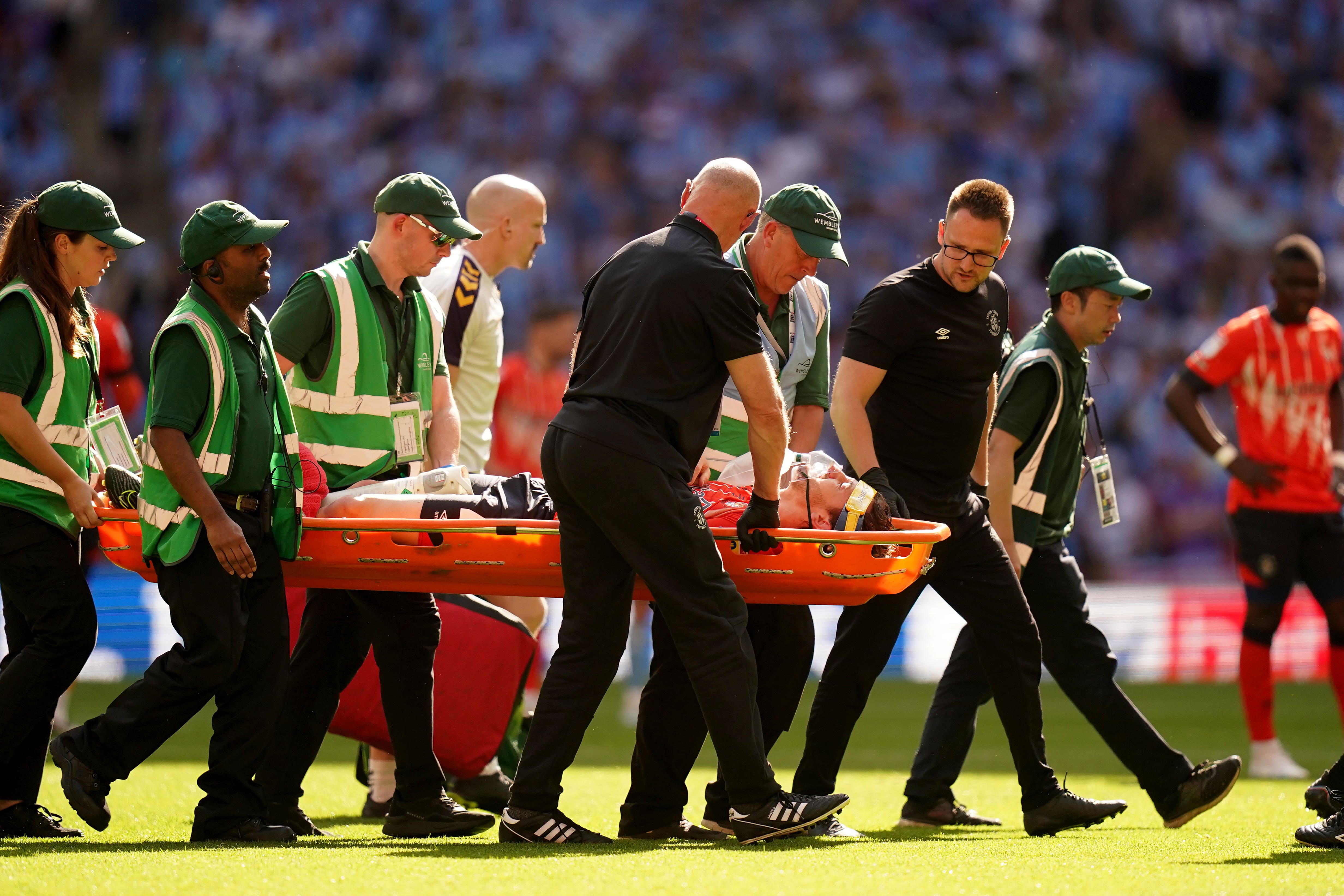 Tom Lockyer was taken to hospital after collapsing at Wembley