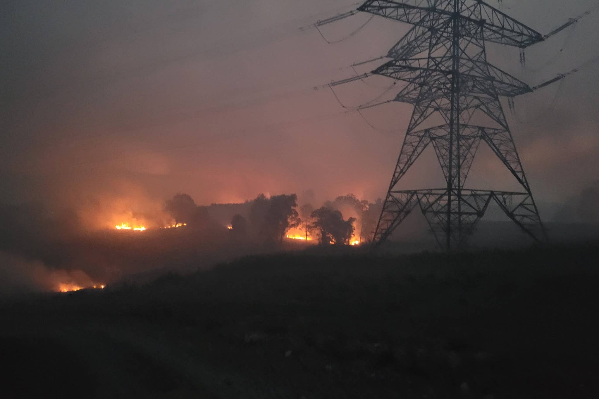 The fire near Cannich south of Inverness has been burning since Sunday afternoon (PA)