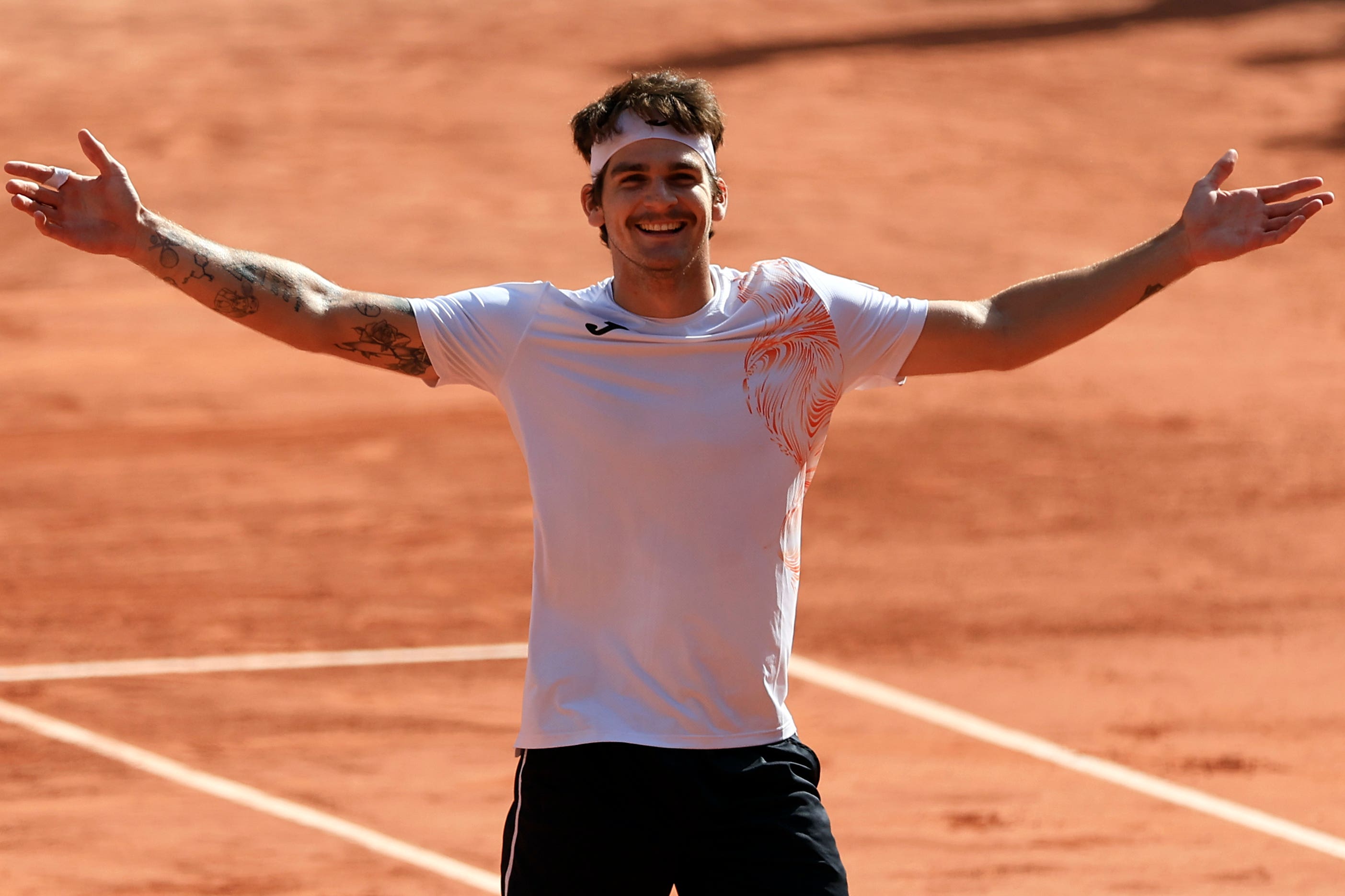 Brazil’s Thiago Seyboth Wild celebrates beating Daniil Medvedev (Aurelien Morissard/AP)