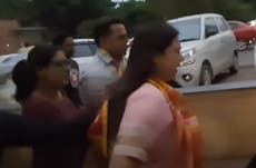 Indian minister runs away from reporter after being confronted over wrestlers’ protest