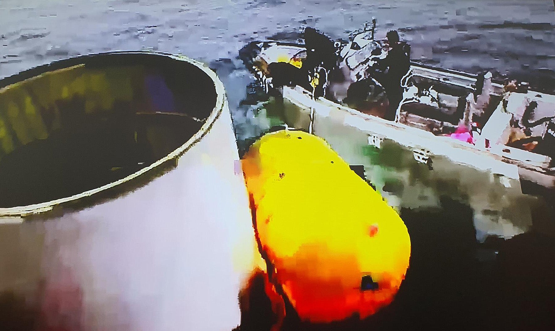 Handout image released by the South Korean defense ministry shows salvaged object presumed to be part of the North Korean space-launch vehicle that crashed into sea following a launch failure