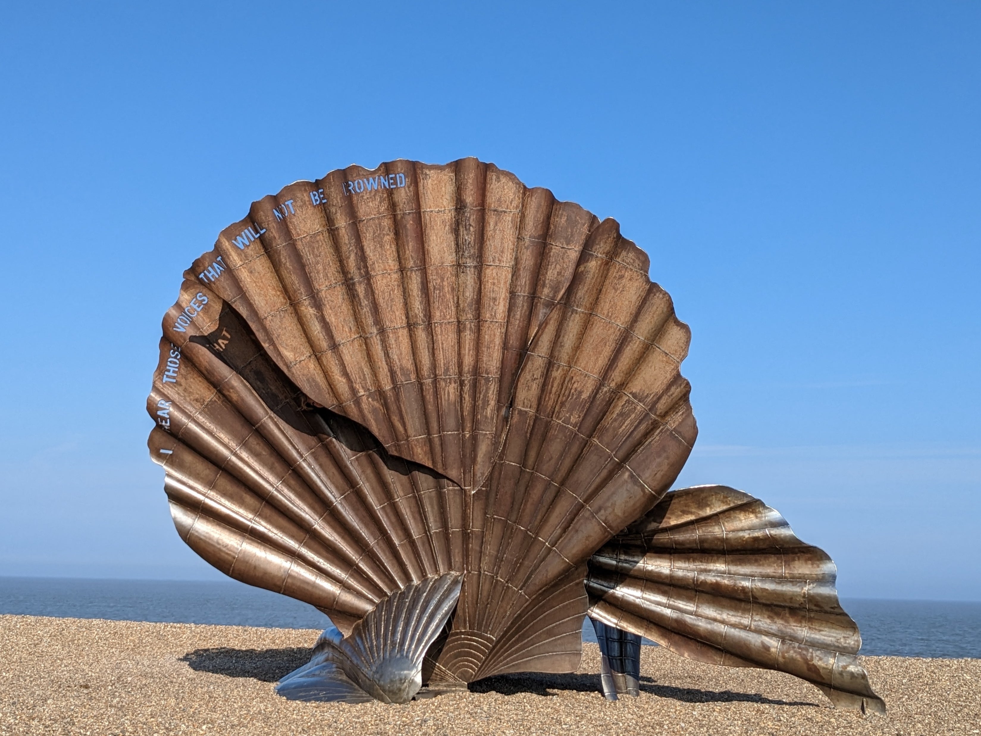 The main stretch of beach features Maggi Hambling’s glinting, cracked-shell sculpture