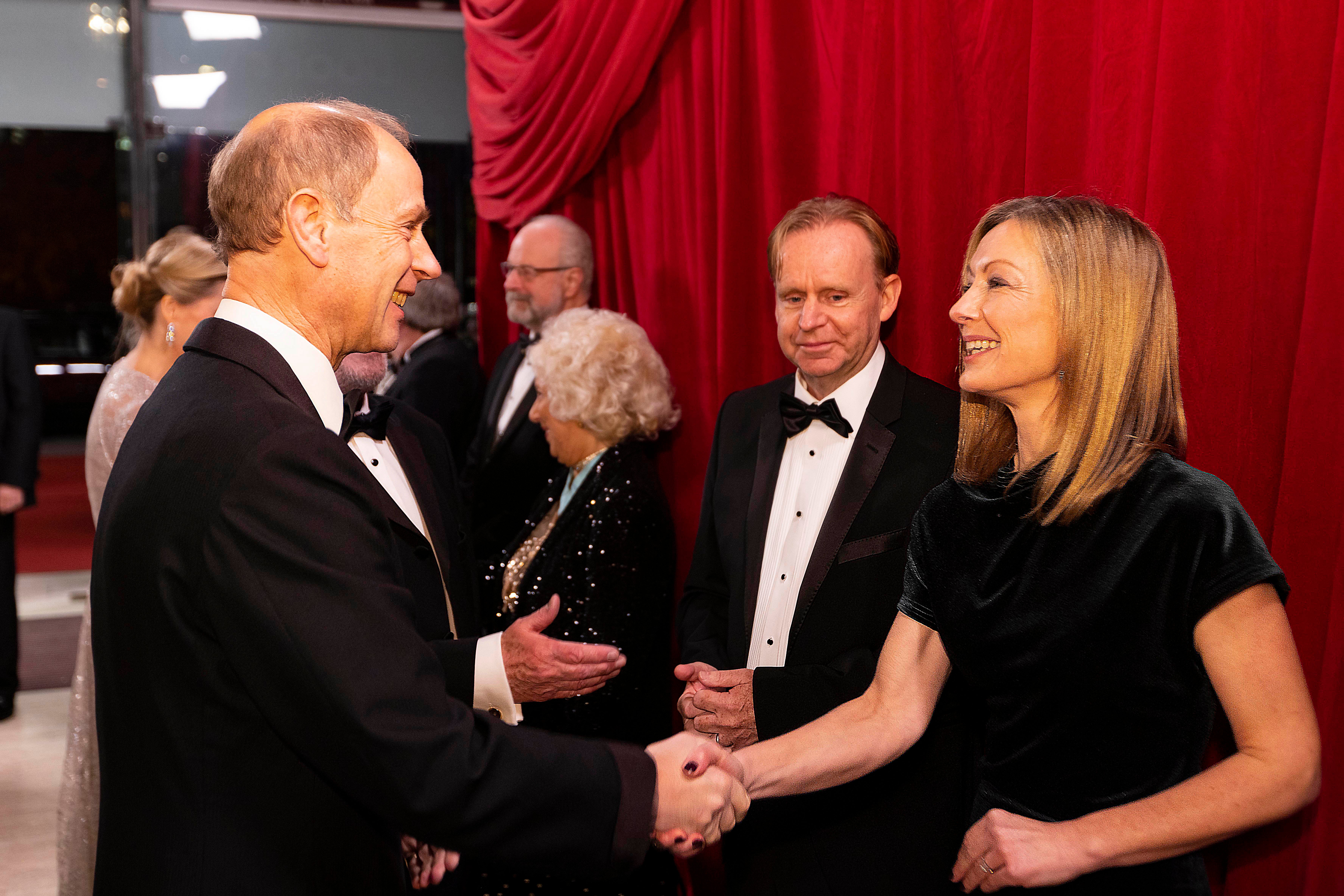 Kevin Lugo (second from right) prepares to meet Prince Edward in December