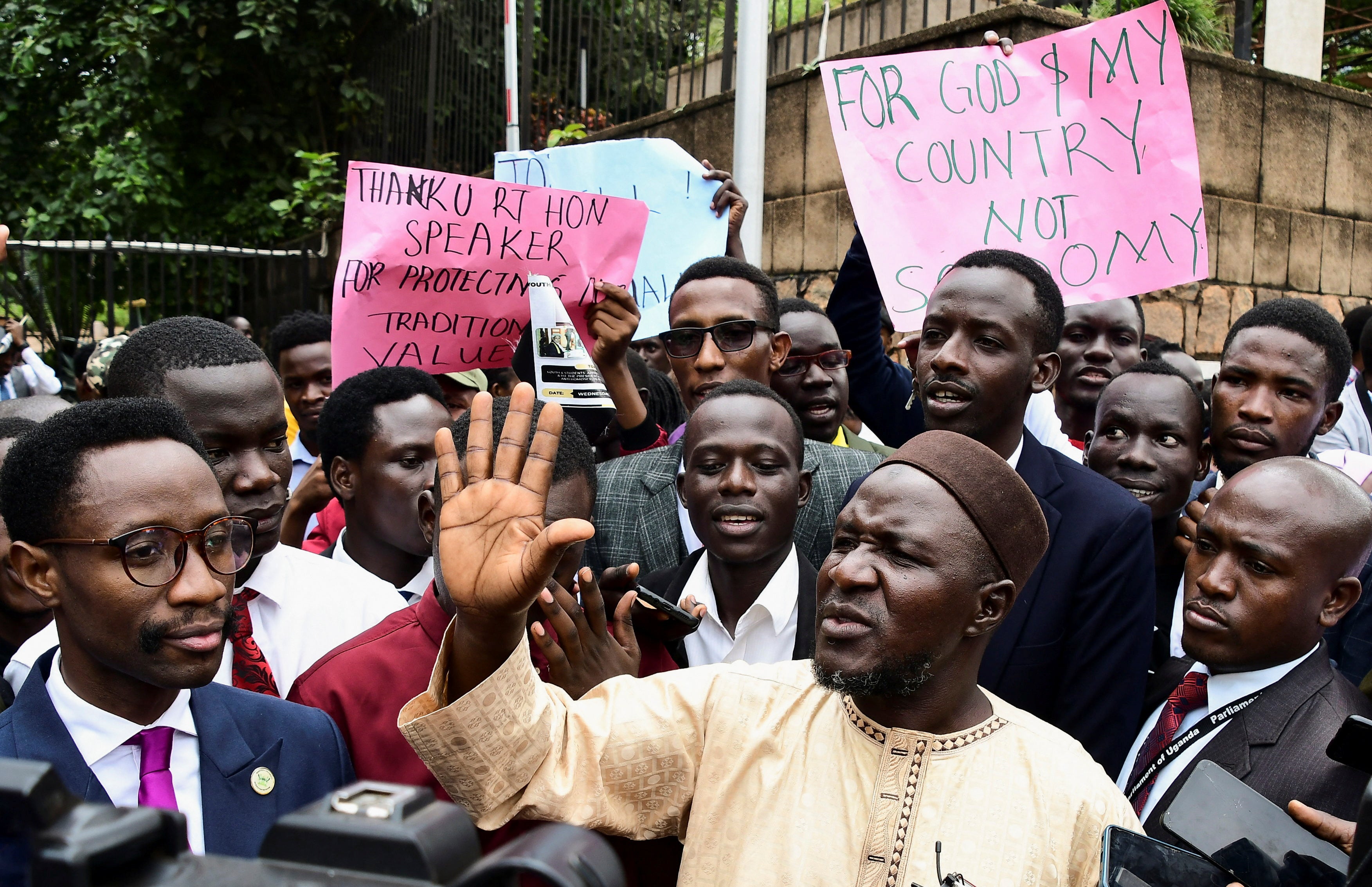 Asuman Basalirwa, a politician who promoted Uganda’s new anti-LGBT+ law, leads supporters in Kampala