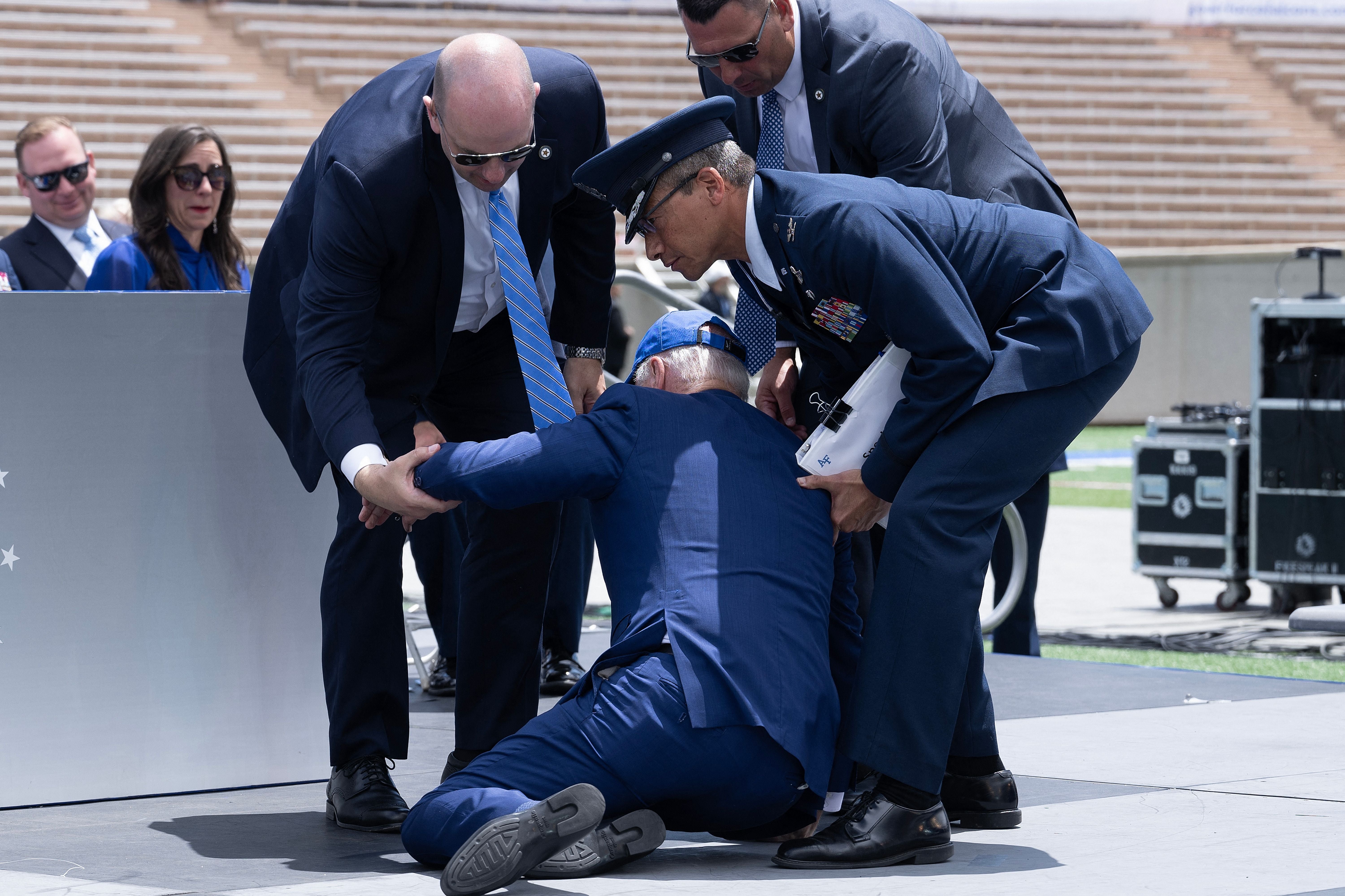 Joe Biden trips and falls at Air Force graduation ceremony