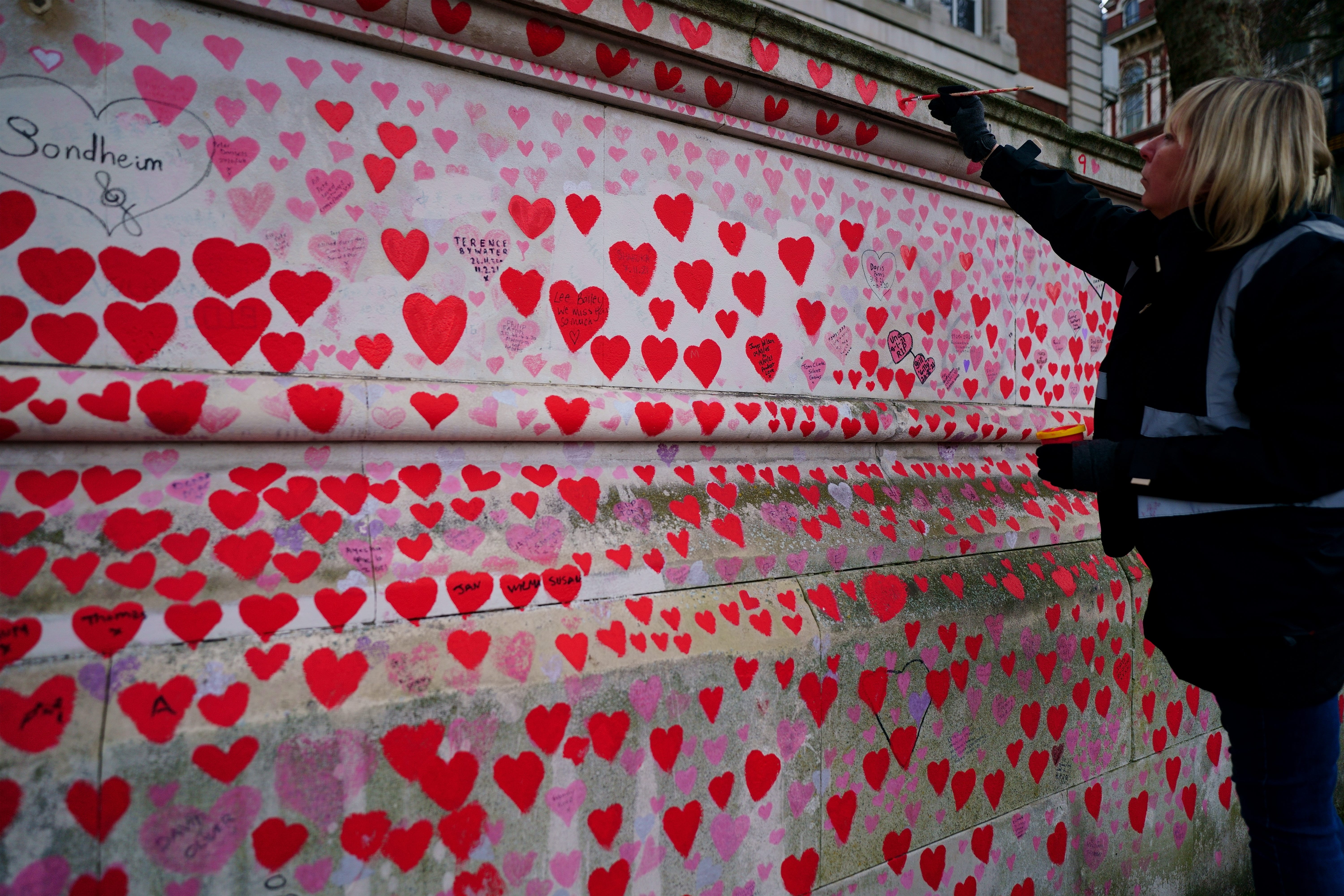 The National Covid Memorial Wall opposite the Palace of Westminster in central London (Victoria Jones/PA)