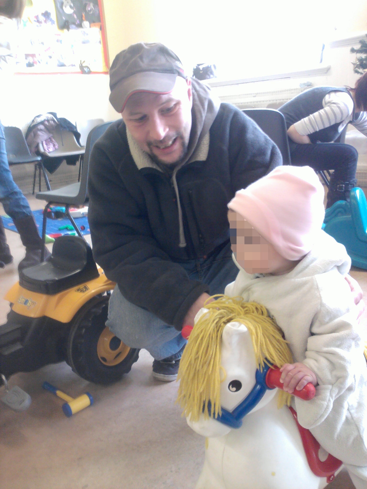 Mr Surtees with his daughter when she was a toddler