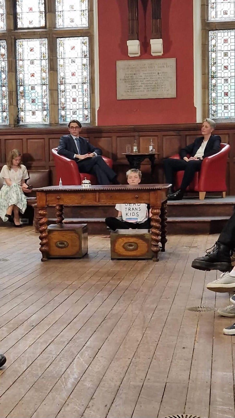 The trans rights protester explained why they glued themselves to the floor during a talk at the Oxford Union