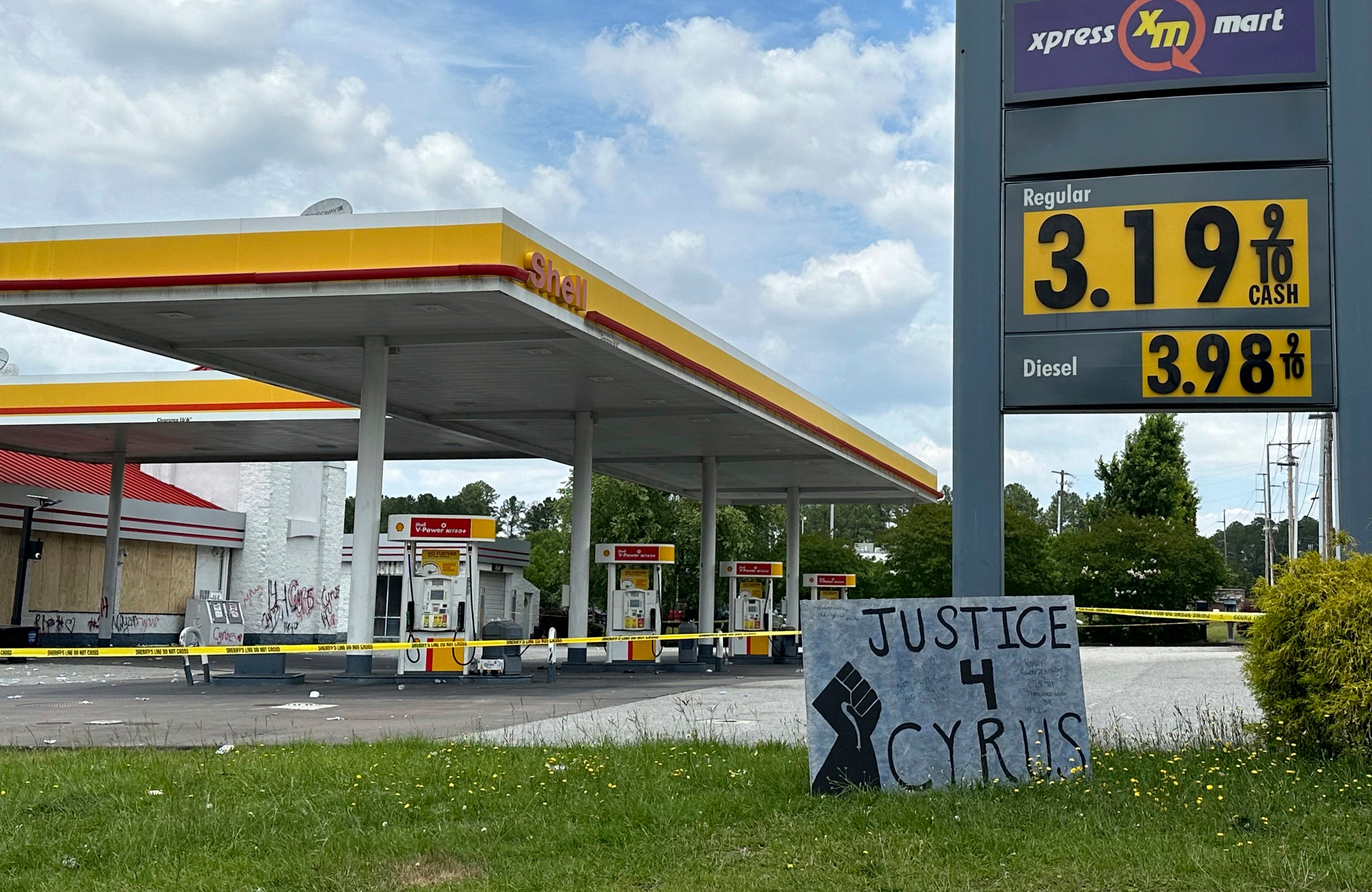 A sign calling for justice is for Cyrus Carmack-Belton is seen outside a gas station on Thursday, June 1, 2023