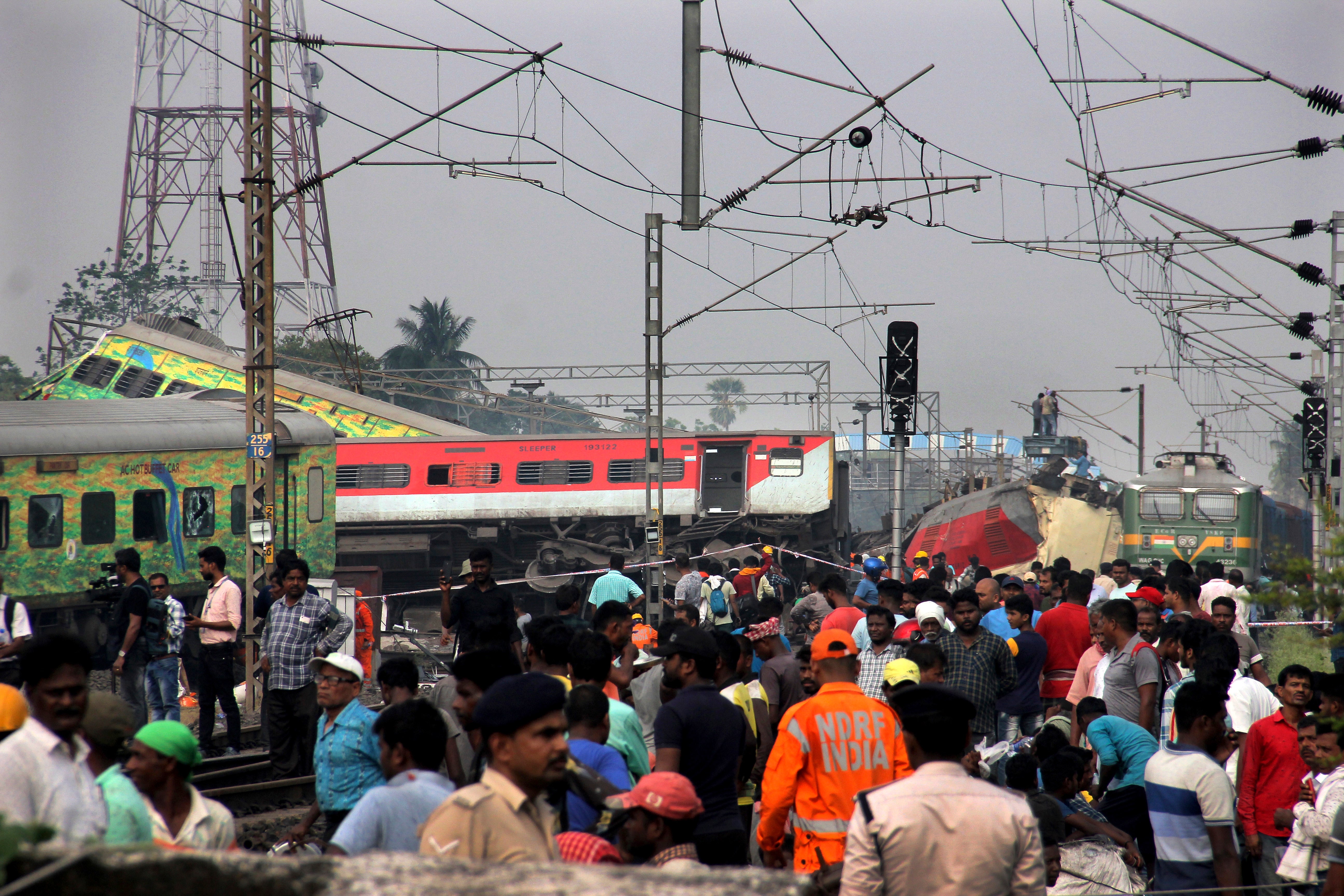 Rescuers work at the site of passenger trains accident, in Balasore district, in the eastern Indian state of Orissa, 3 June 2023