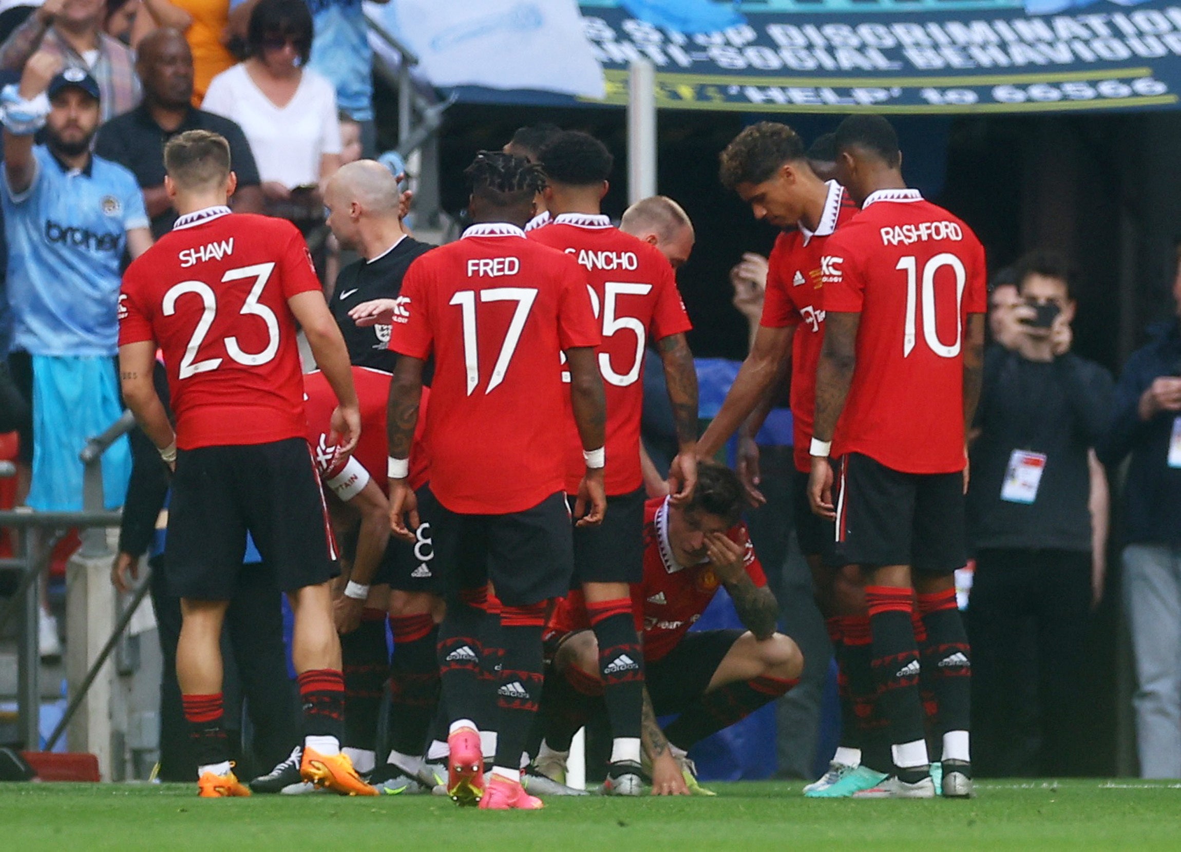 Victor Lindelof reacts after being struck near his left eye