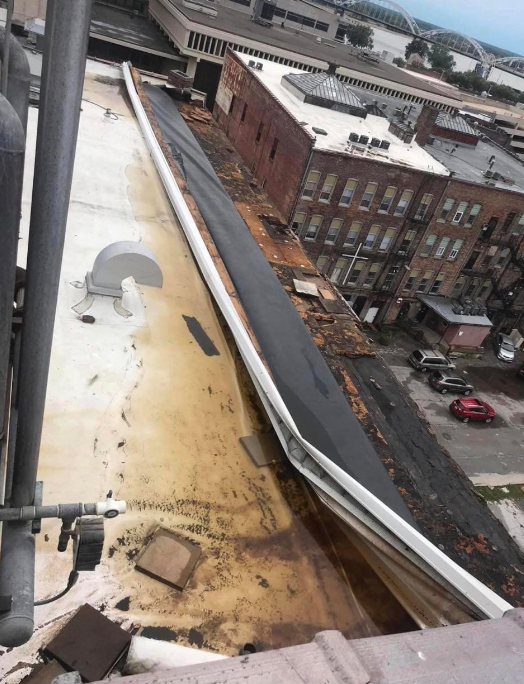 Aarron Aguilar took this picture of The Davenport’s roof after a storm hit Iowa in 2020. Mr Aguilar says he believes the damage caused three years ago may have been one of the underlying reasons why the structure finally came crashing down