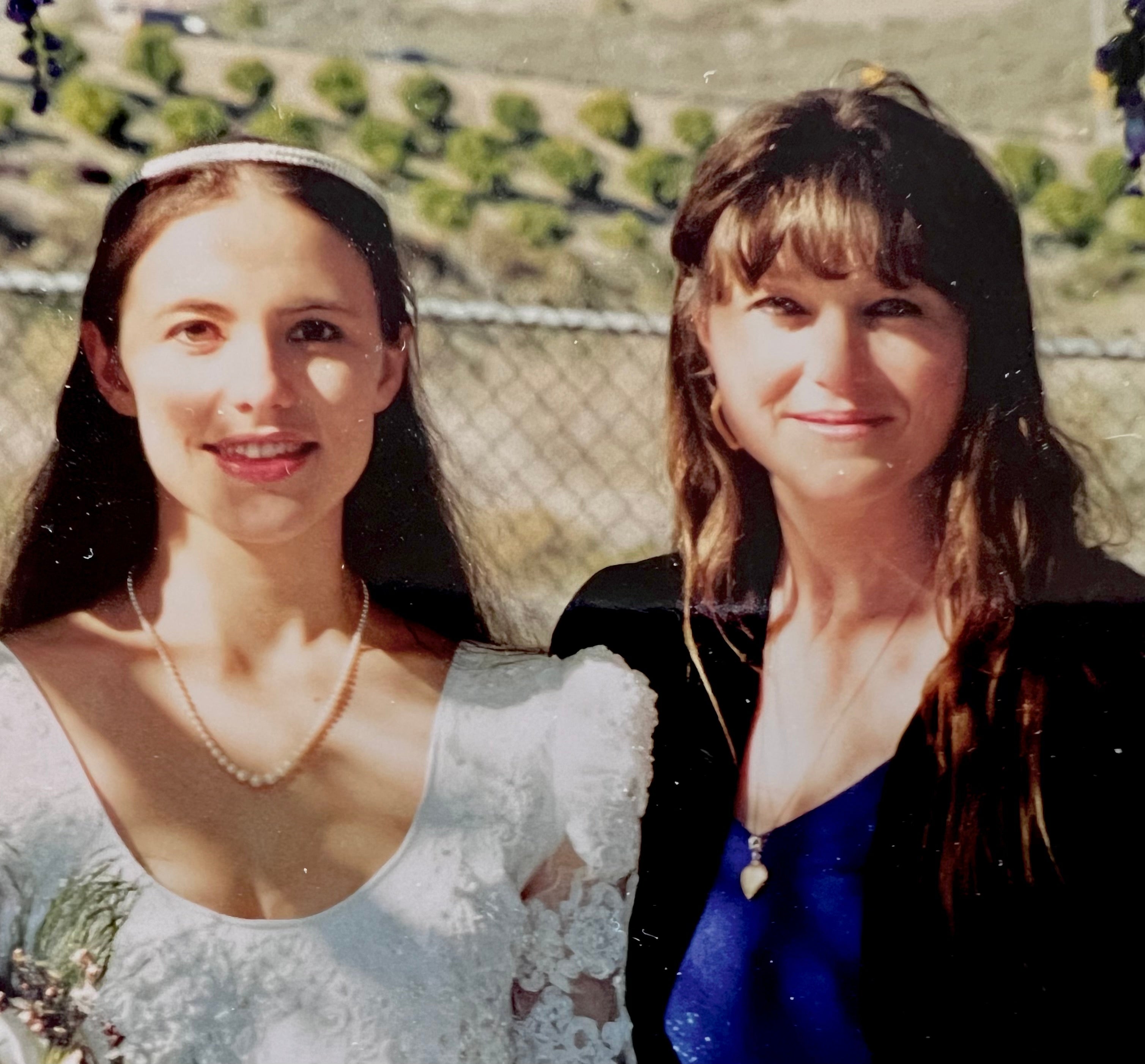 Francesca Williams, left, with her mother Marianna Benedict-Bacilla on her wedding day. Williams was killed in a home invasion on her farm in Ecuador on 20 May