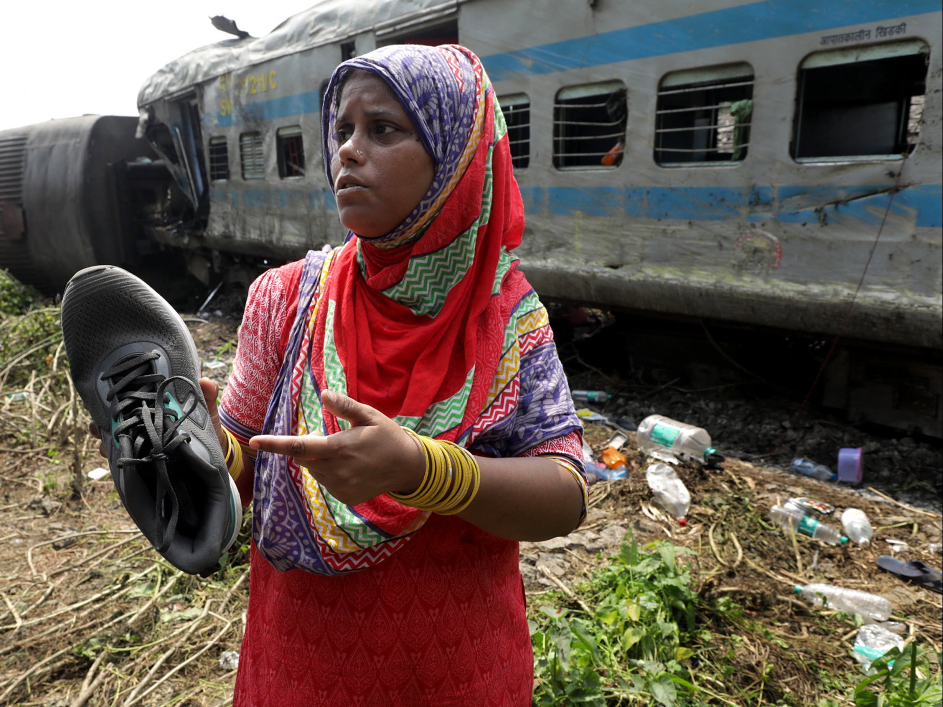 Tammanna Begum shows a shoe of her missing son