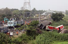 Odisha train accident – latest: Graphic images released by India authorities as families pray for miracle