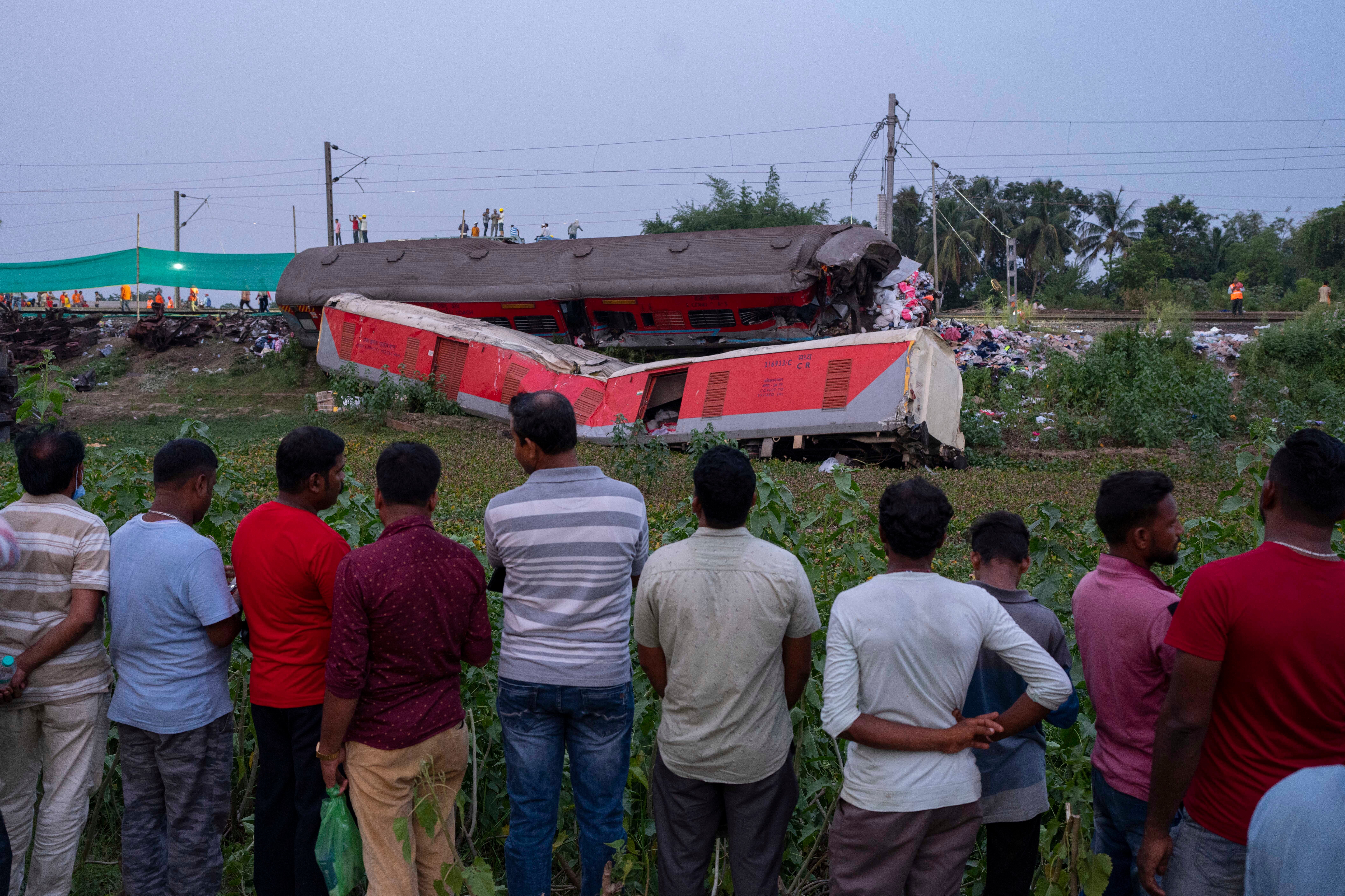 As India grieves train crash that killed 275 people, relatives still wait for bodies of loved ones