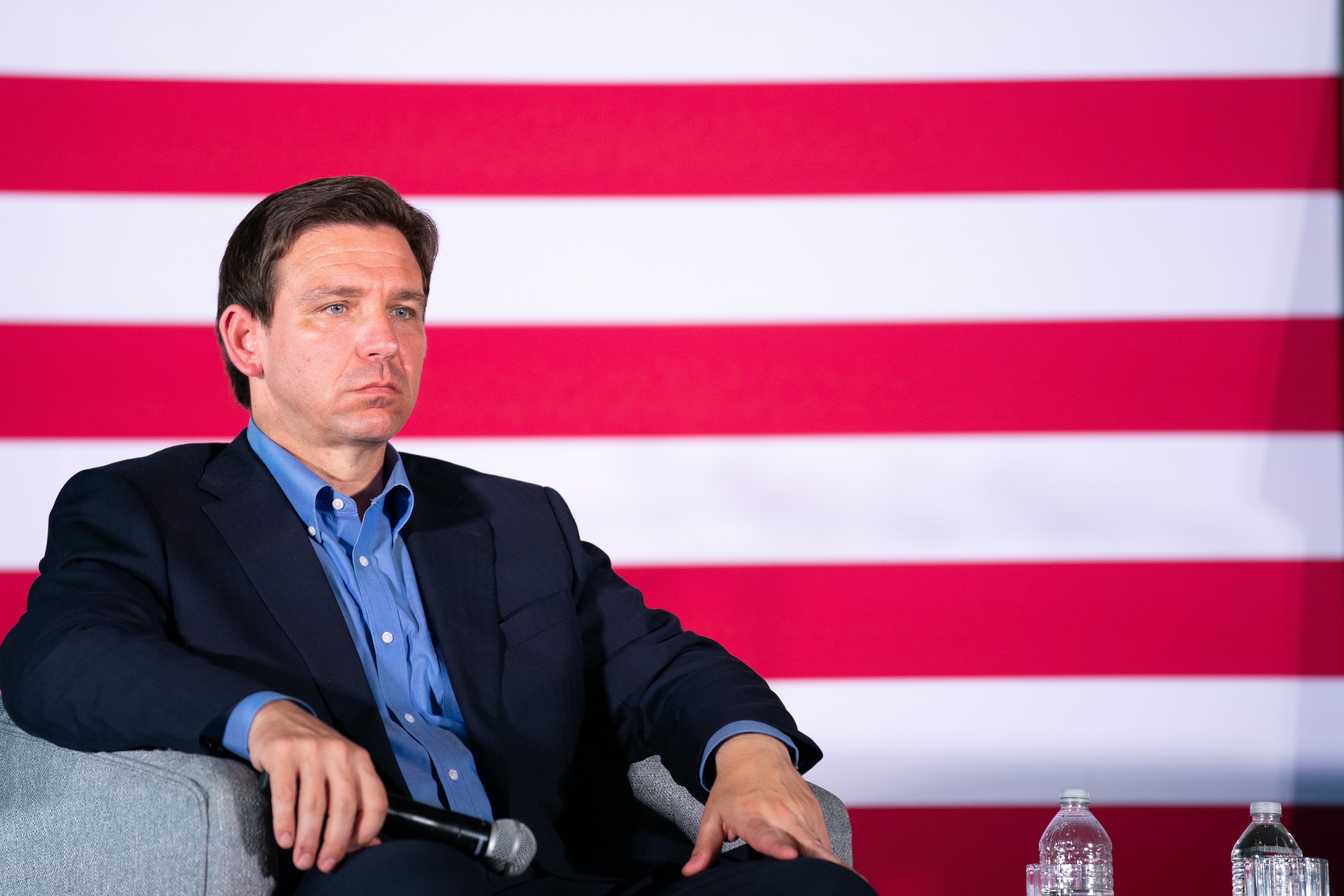 Presidential candidate and Florida Governor Ron DeSantis listens to his wife speak to a crowd on June 2, 2023 in Gilbert, South Carolina.