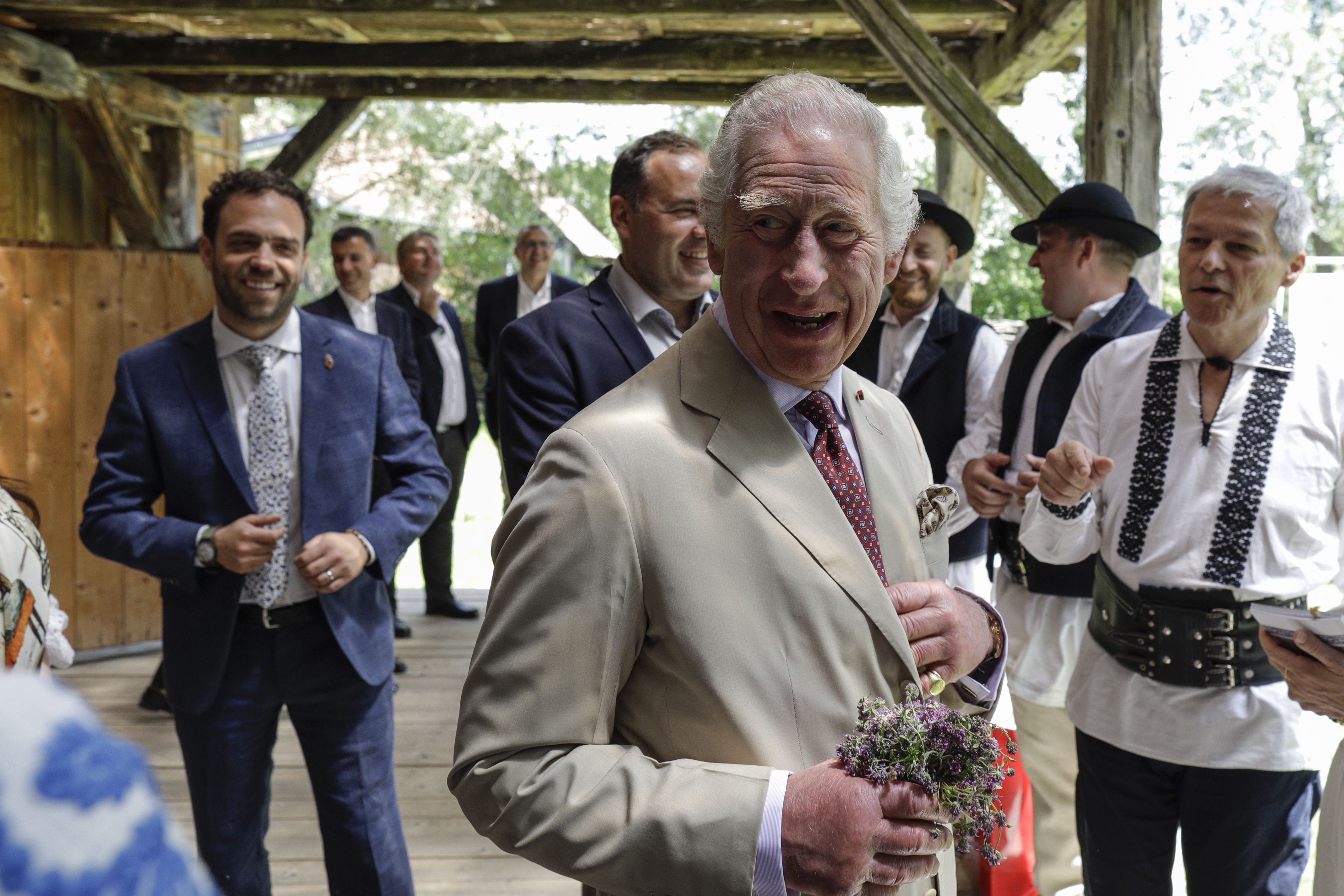 The King met with heritage workers in the Transylvanian village of Viscri (Octav Ganea/PA)