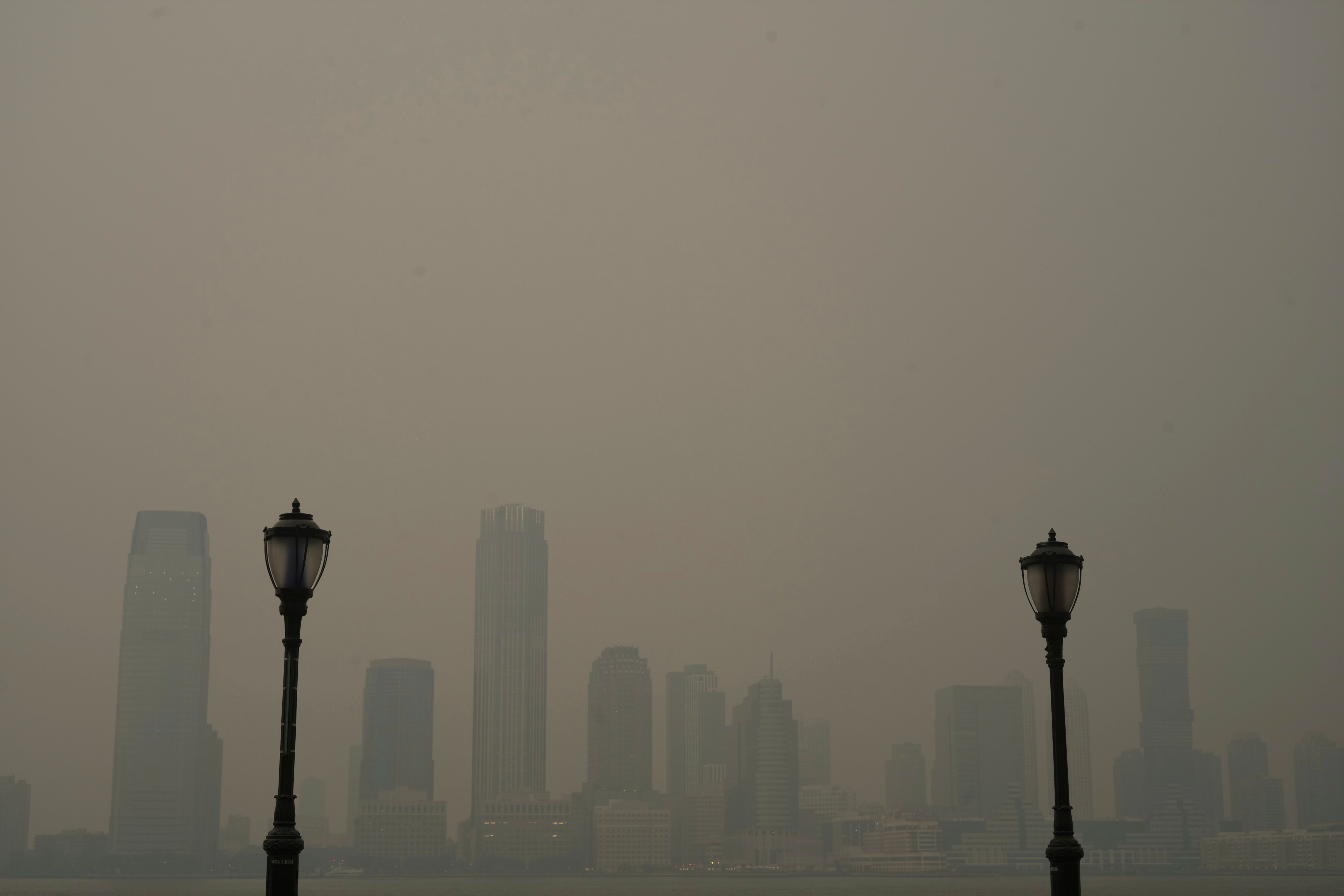 Buildings in Jersey City are partially obscured by smoke