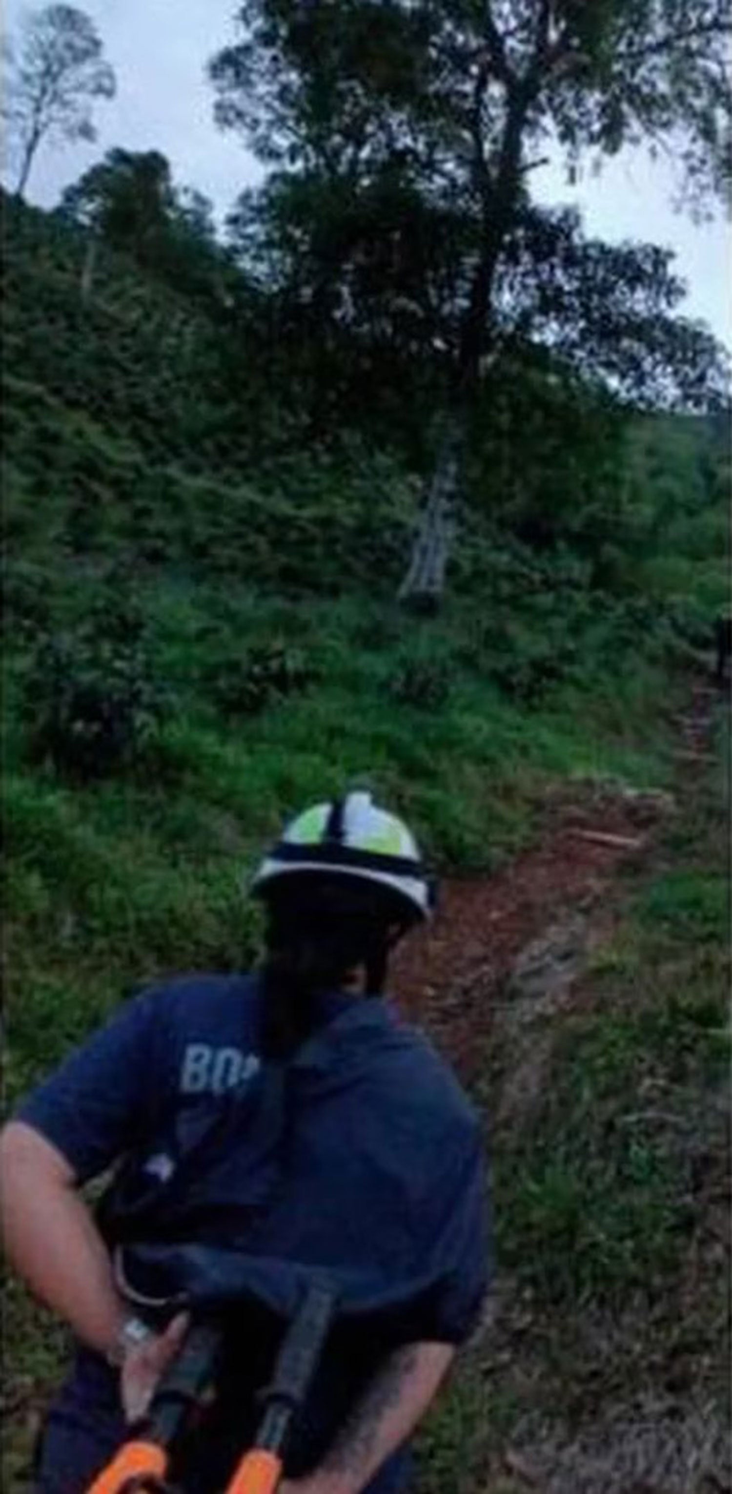 Rescue crews are seen working to recover Suaza’s body